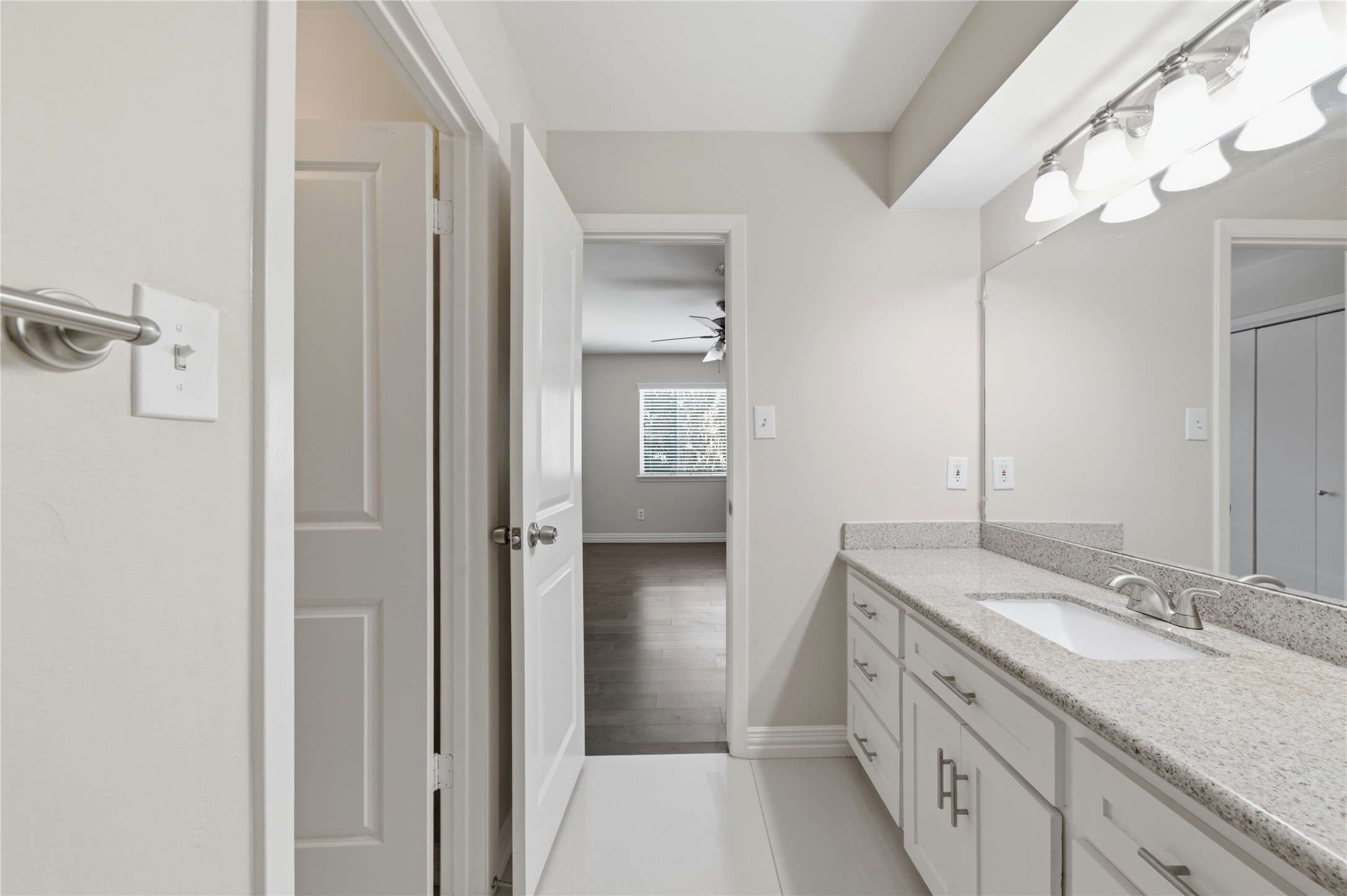 Another full bathroom with spacious vanity.