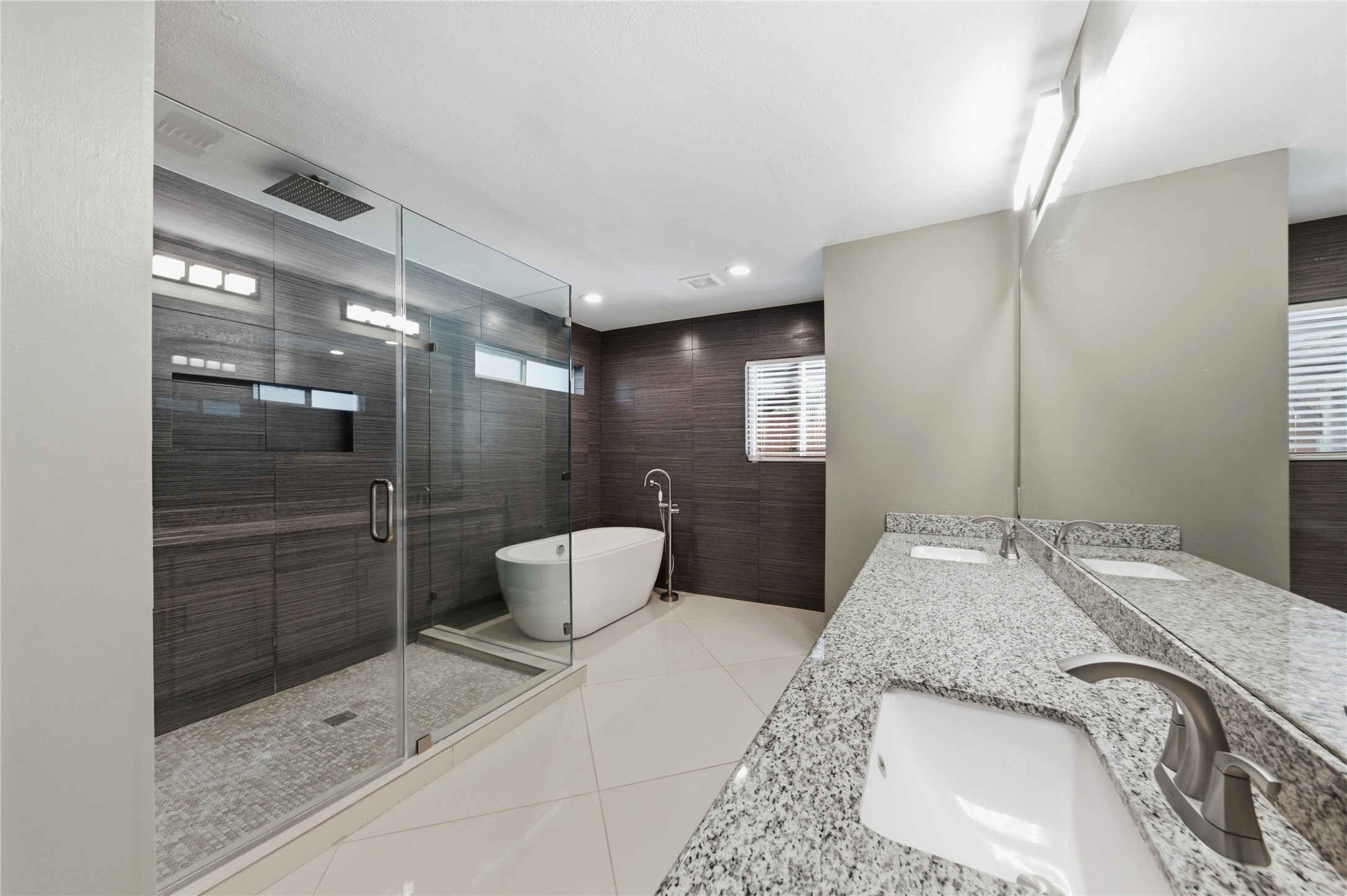 Spa-inspired primary bathroom featuring upscale finishes and a deep soaking tub designed for ultimate relaxation.