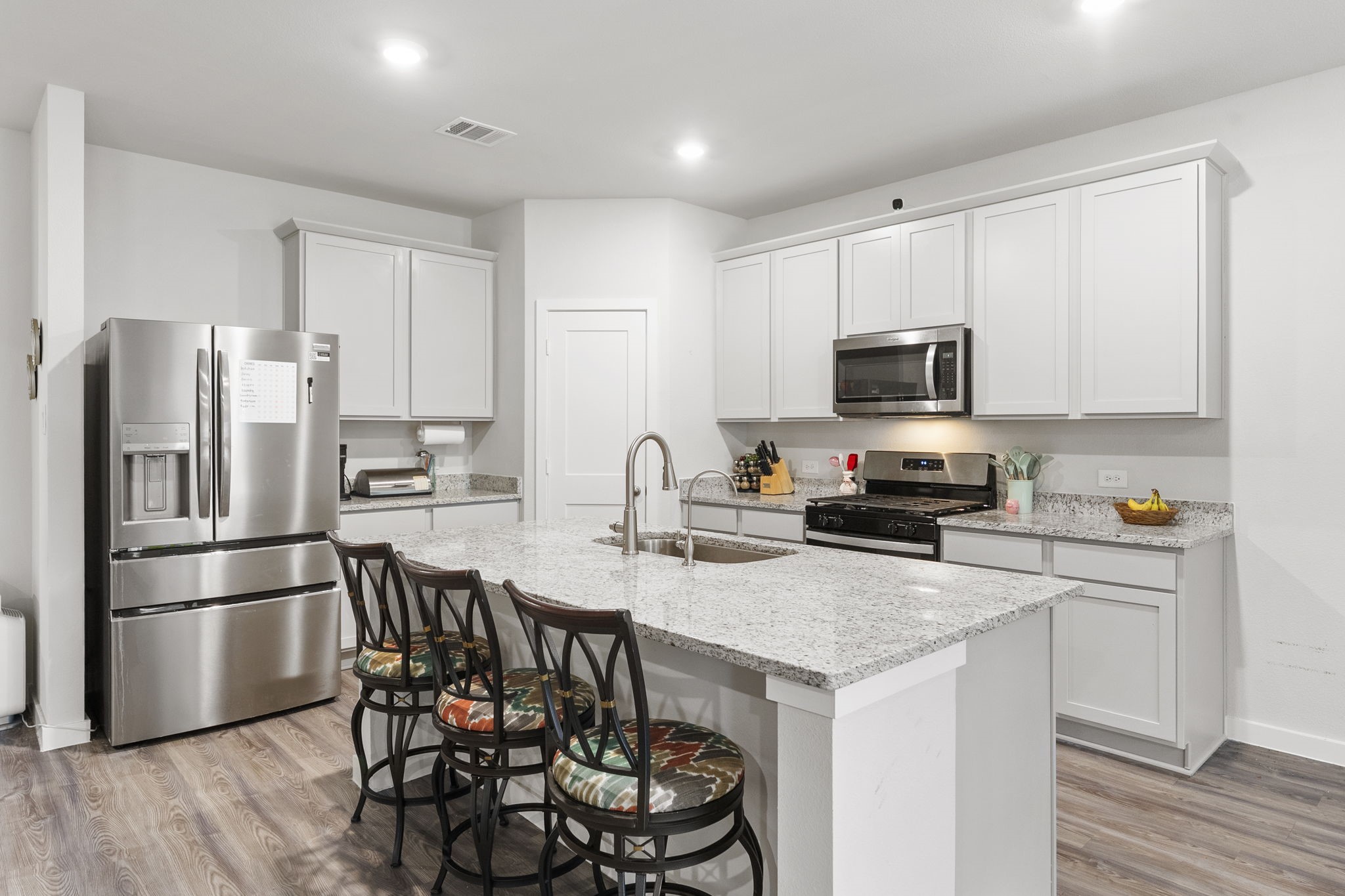 Ample counter and storage space in the island kitchen.