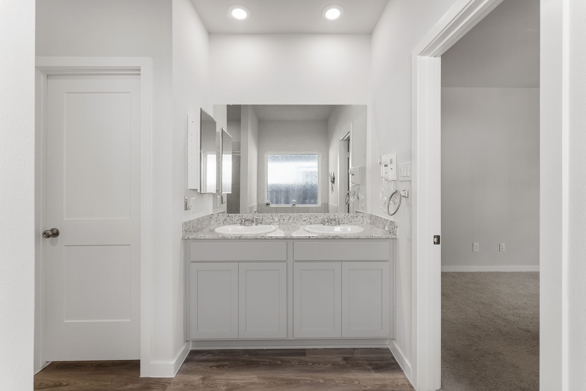 Double sinks in primary bath.