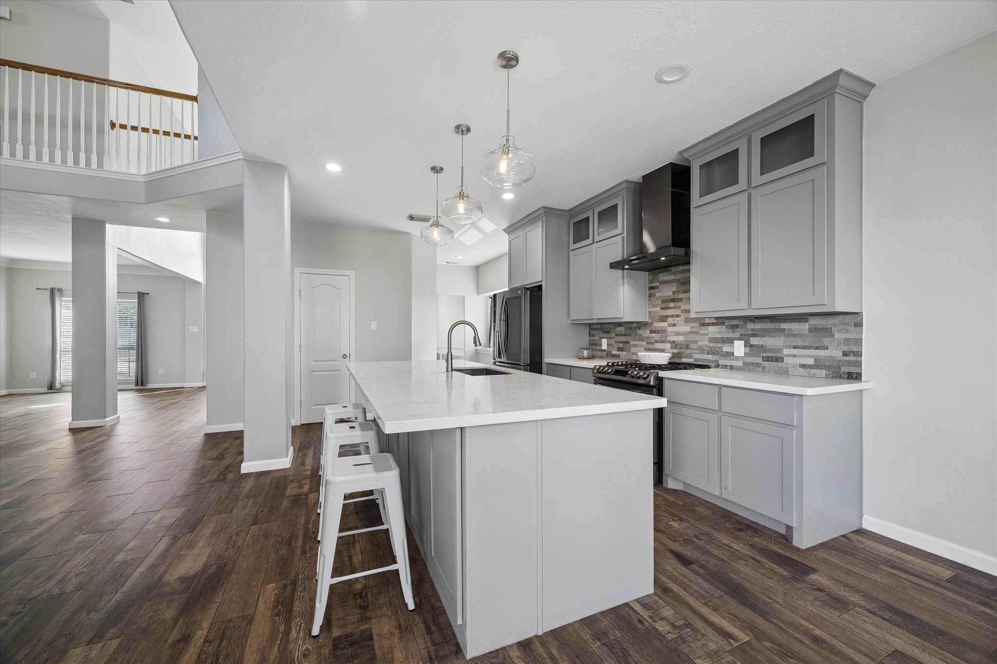 Lots of counter space and storage complete your new kitchen! The door in the center opens to a full PANTRY.