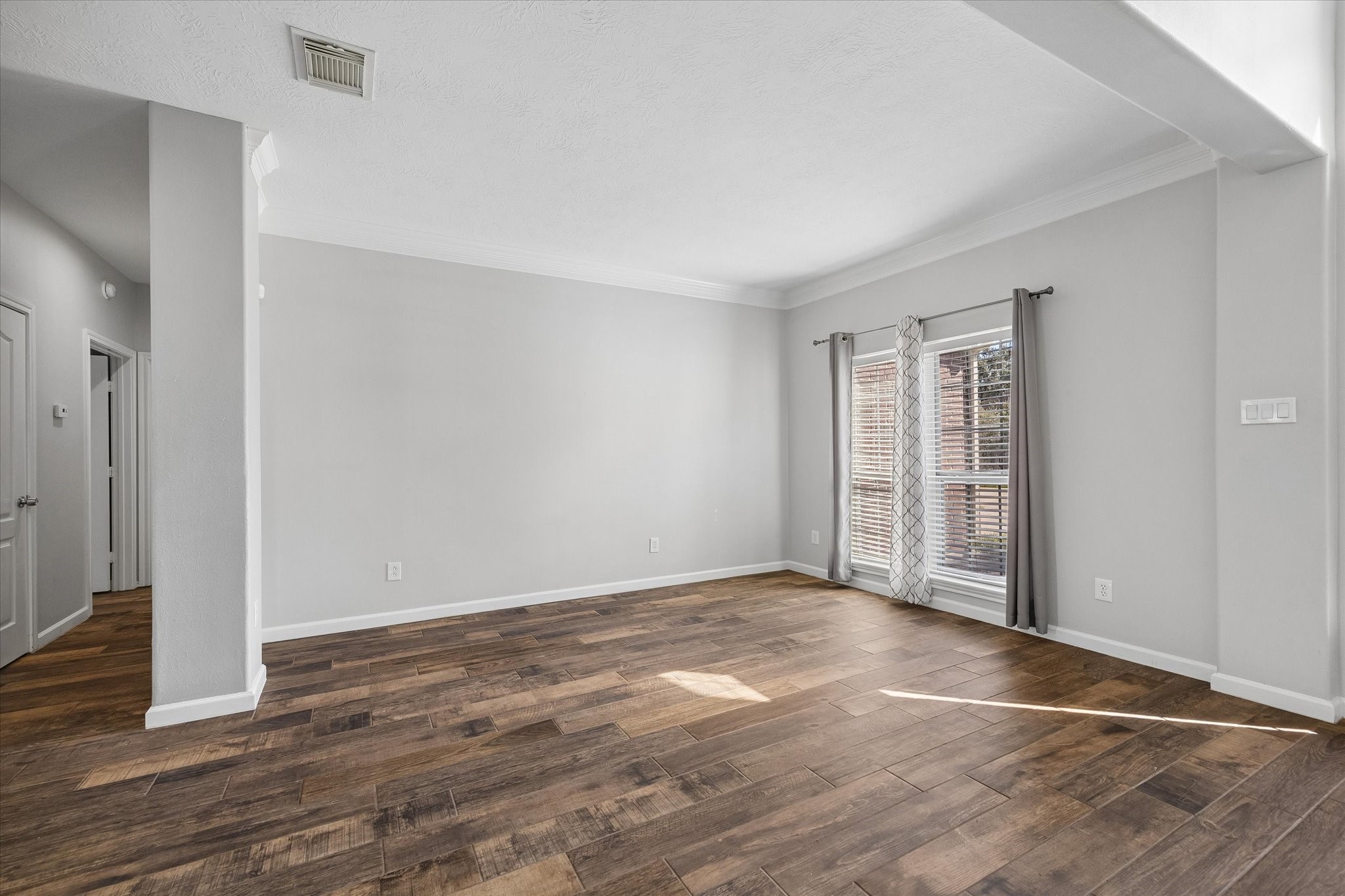 A FLEX SPACE at the front of the home can be used as a formal living area, lounge area, office space - use to fit your needs!