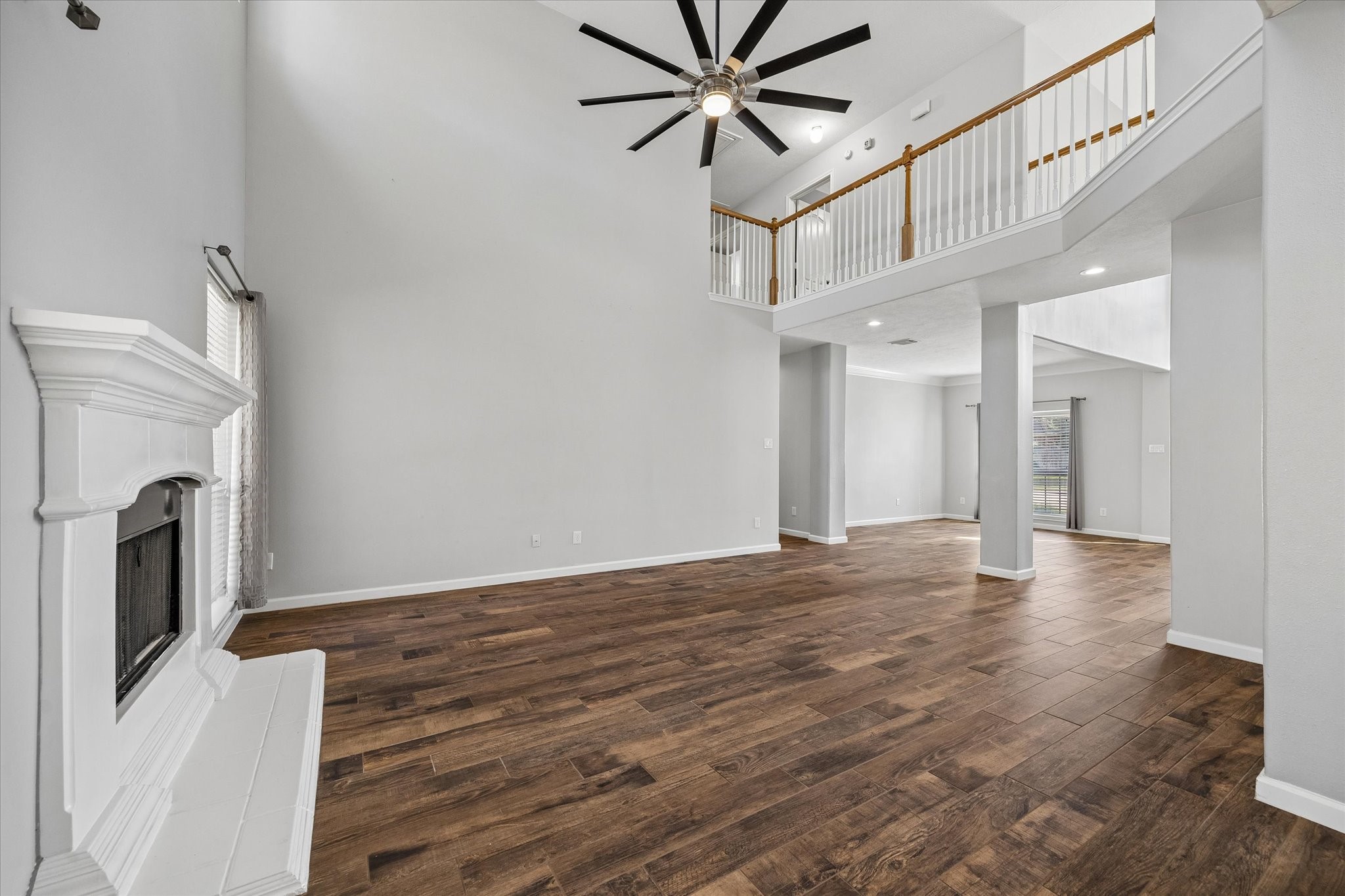 Beautiful wood-look tile runs throughout the open spaces. A modernized ceiling fan keeps everyone cool!