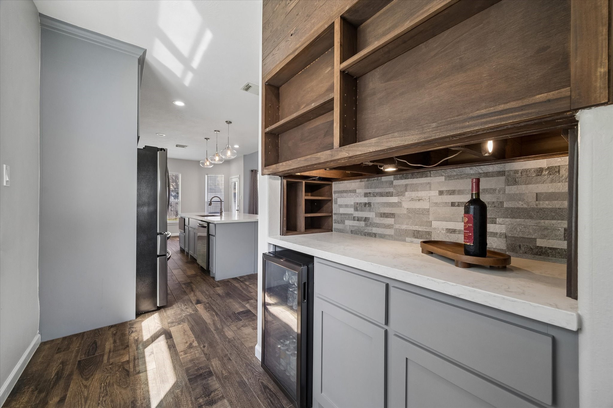 Great extra storage and the beverage fridge is included!