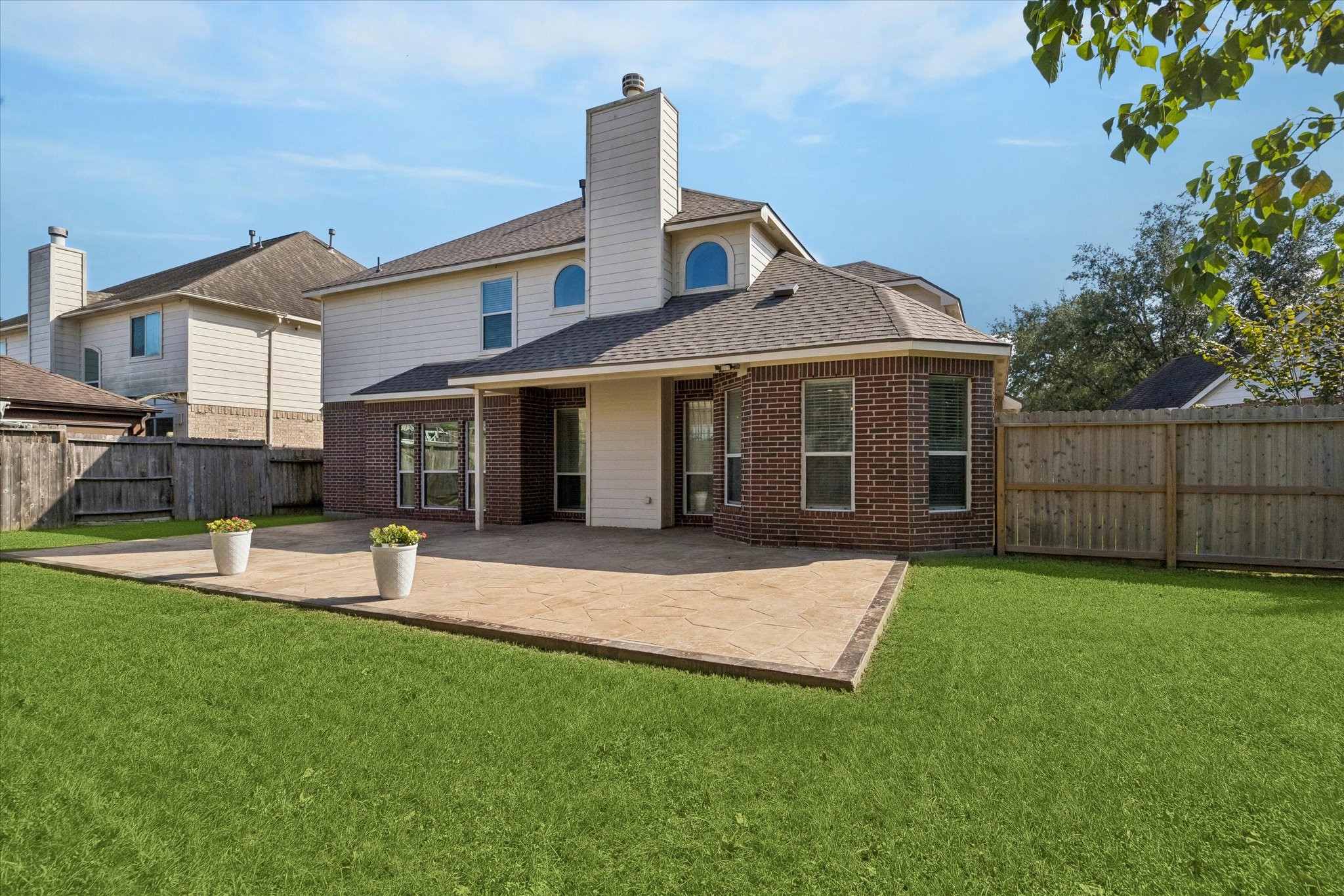 A HUGE PATIO and plenty of lawn space is ready for you and your family and friends to gather and create fun, lasting memories!