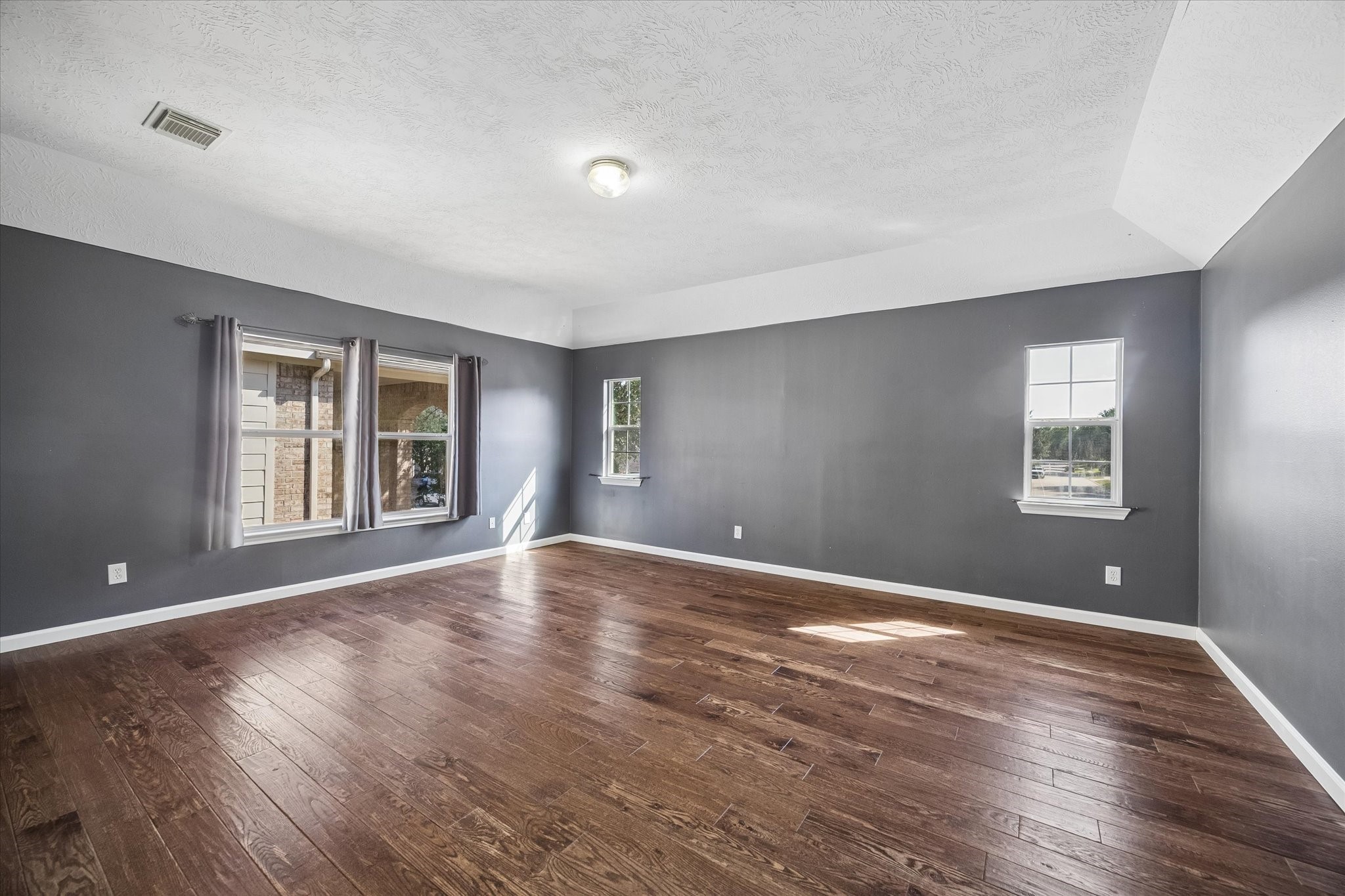A large GAME ROOM upstairs is the perfect hang-out spot for family fun - movies, play room, and more!