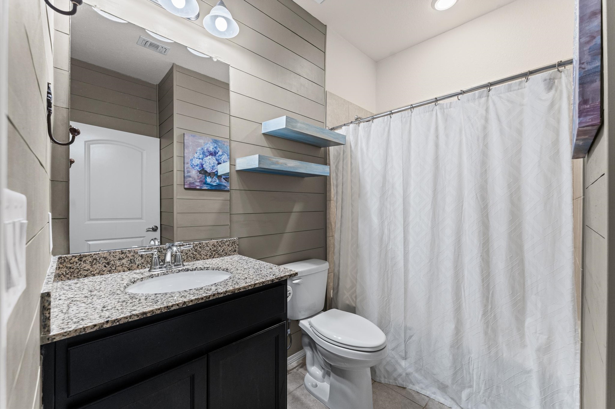 A well-designed guest bathroom balances high-end hospitality with practical efficiency, offering your visitors a private, resort-like retreat that maximizes utility within a typically compact footprint.