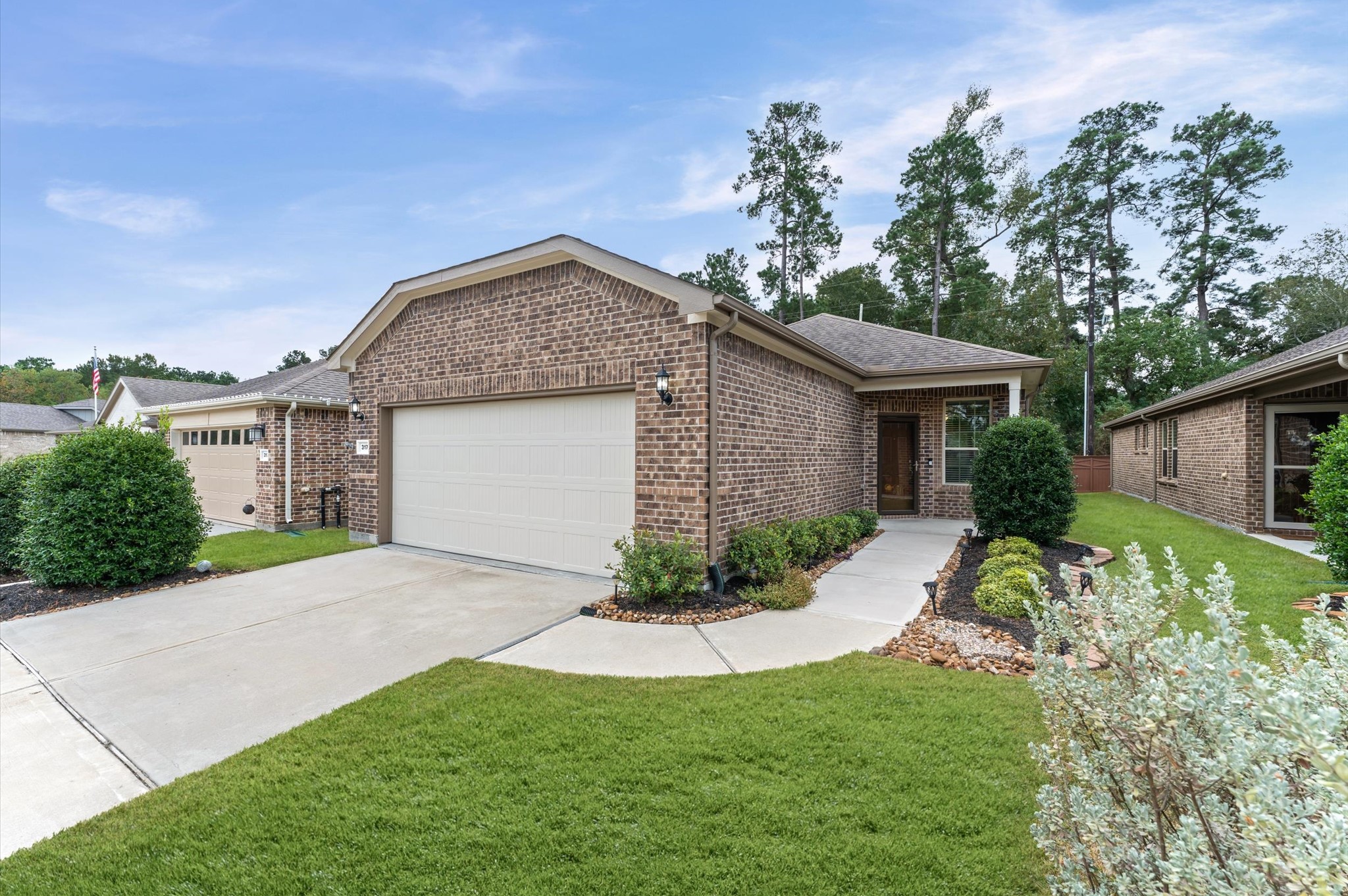 An optimized two-car garage with ample storage space completes this exceptional home, providing a highly organized, seamless transition from the vehicle to the living quarters while keeping utility tools and bulk items completely hidden. An optimized two-car garage with ample storage space completes this exceptional home, providing a highly organized, seamless transition from the vehicle to the living quarters while keeping utility tools and bulk items completely hidden.