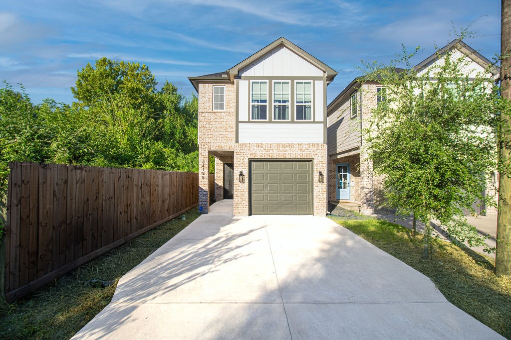 This charming two-story home features an eye-catching combination of brick and modern siding, a welcoming covered entryway.  Built in 2022, this home offers modern style and inviting curb appeal from the moment you arrive!