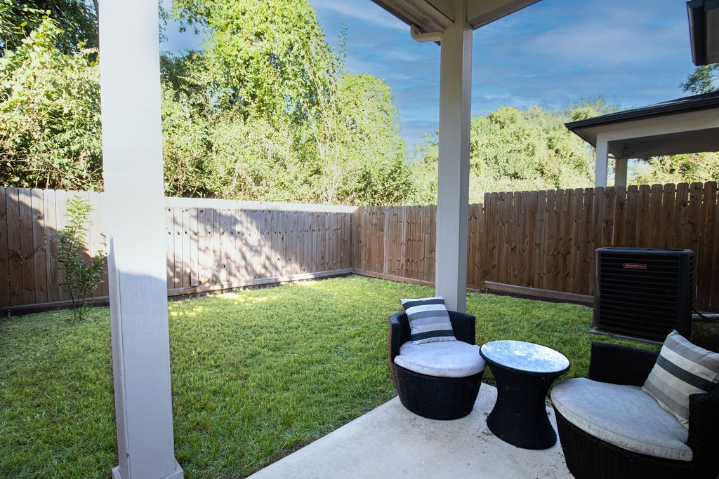 Large fenced yard with covered patio!