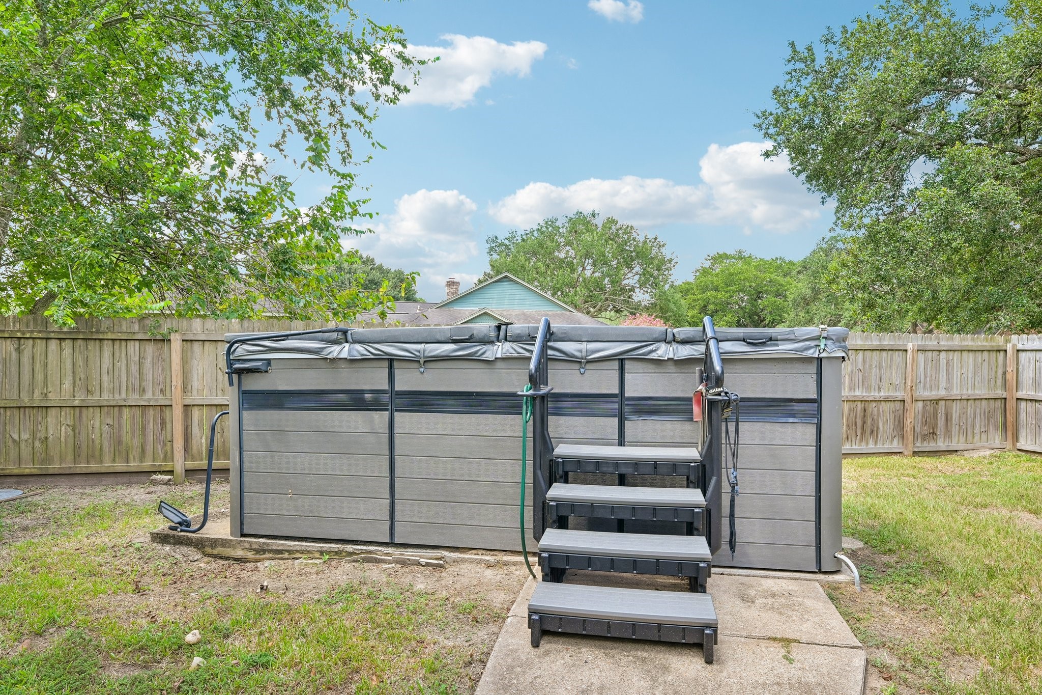 Spa you can enjoy year round whether it is hot or cold outside. Fully fenced side yard, so very private as well.