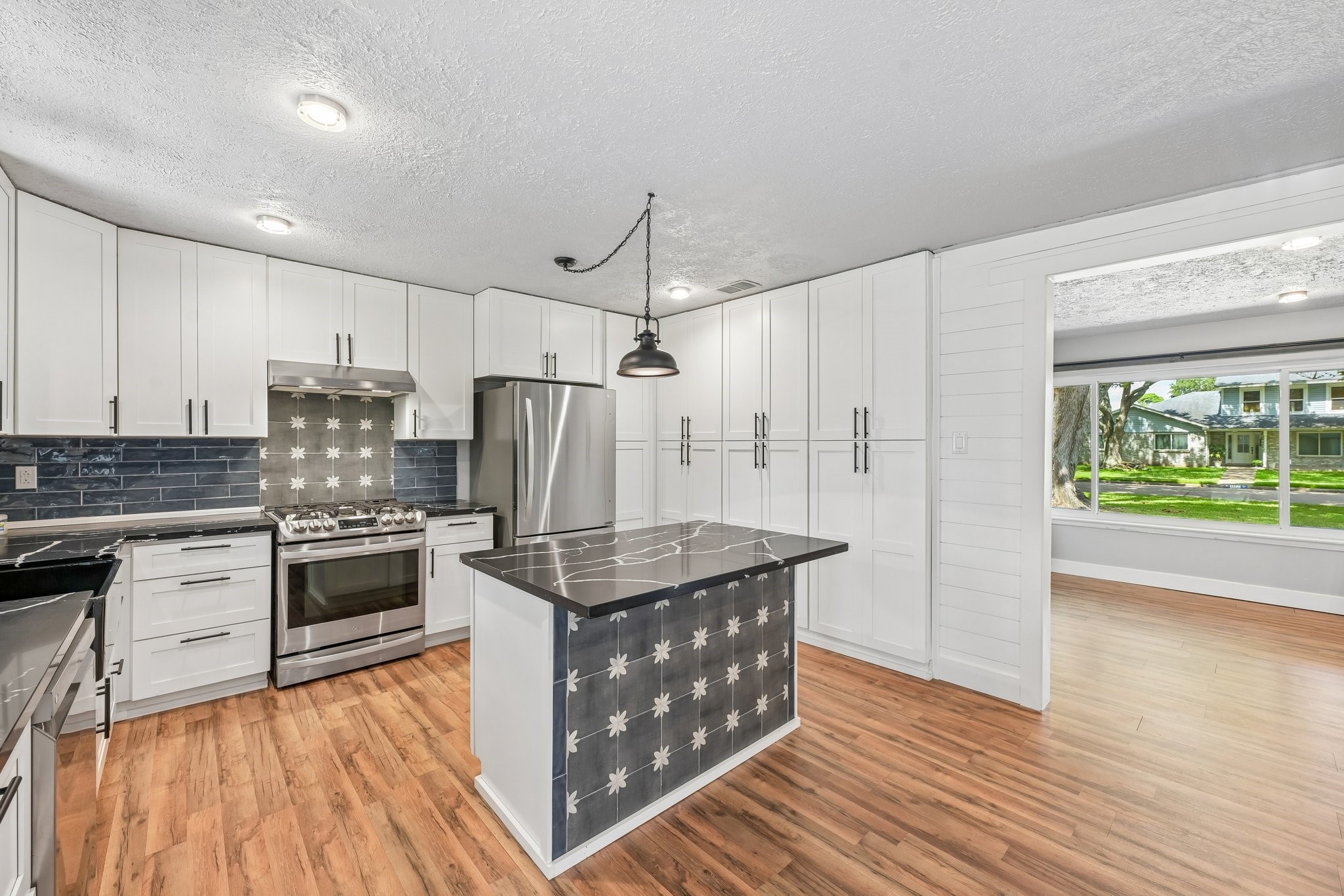 Refrigerator included with sale.