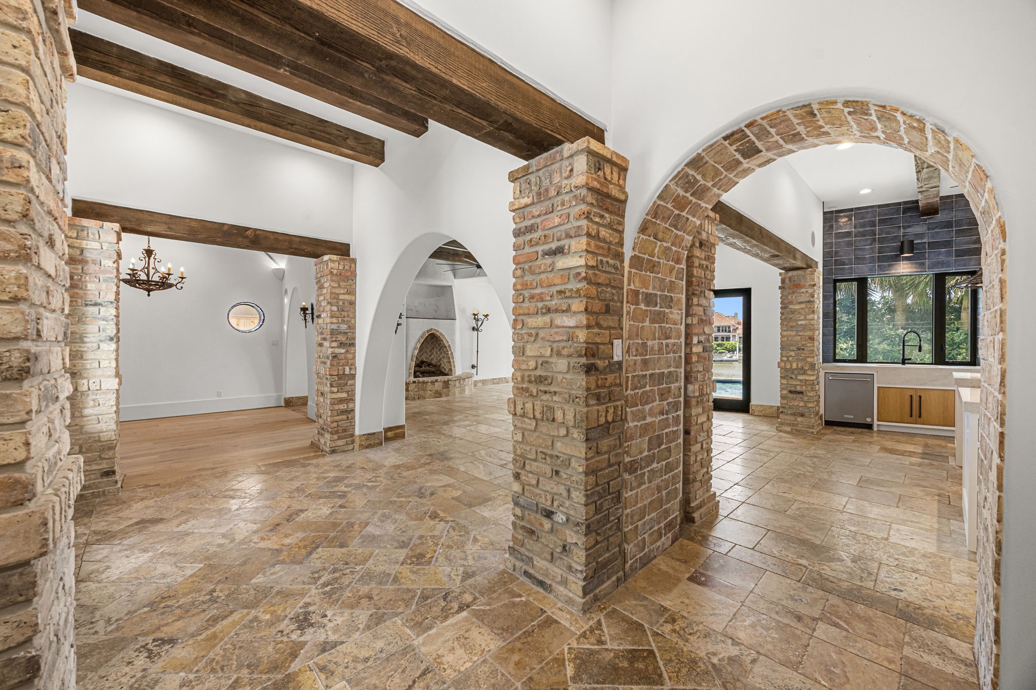 From the hallway, stunning brick details create a dramatic architectural statement, adding texture, character, and old-world charm.