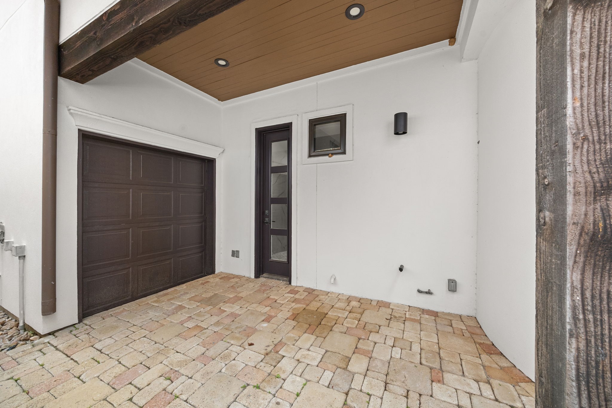 The three-car garage includes a golf cart door with direct access to the back of the home, adding both functionality and convenience.