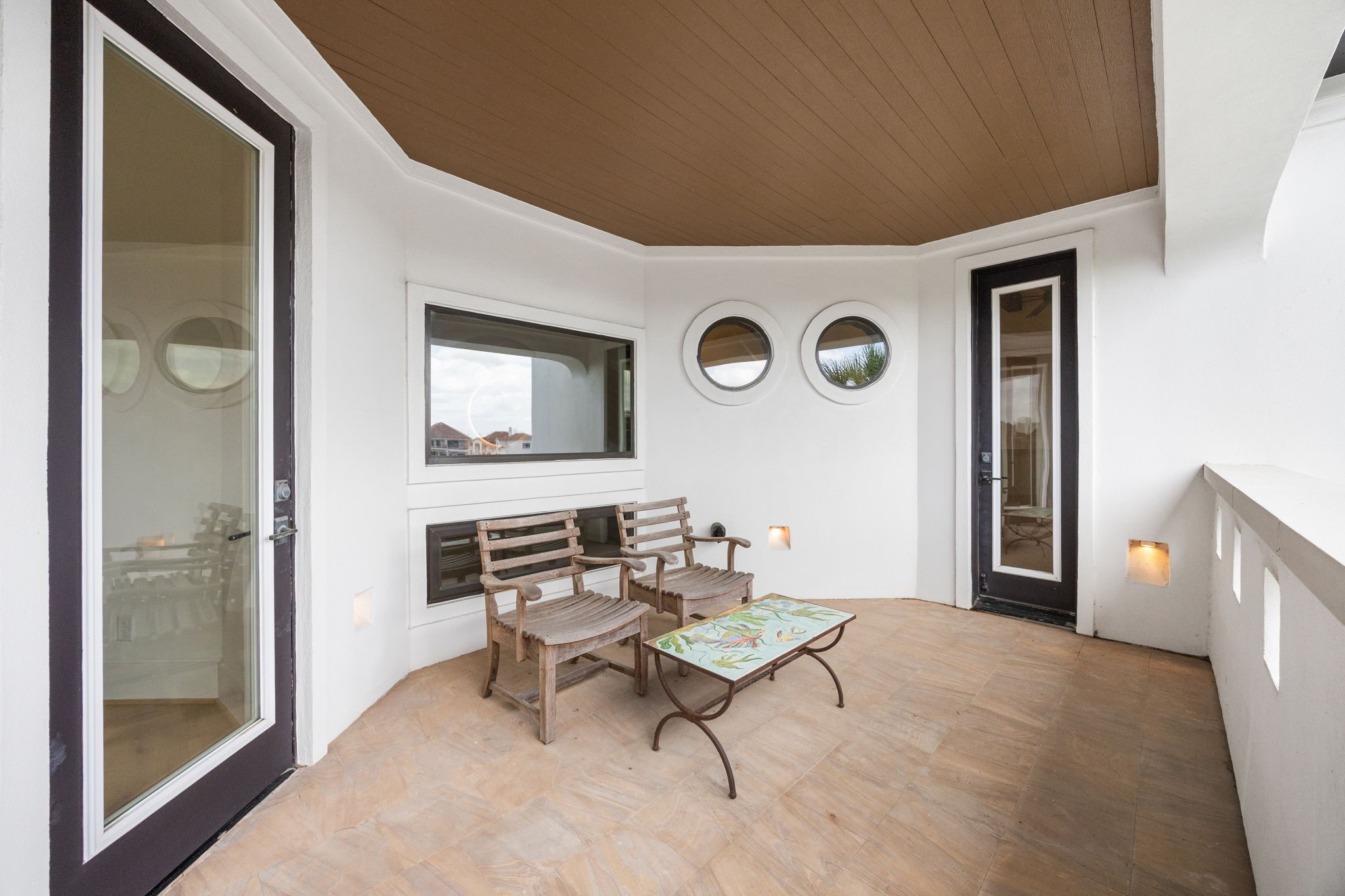 A private balcony extends from both the primary bedroom and flex room, offering seamless indoor-outdoor living and elevated resort-style views.
