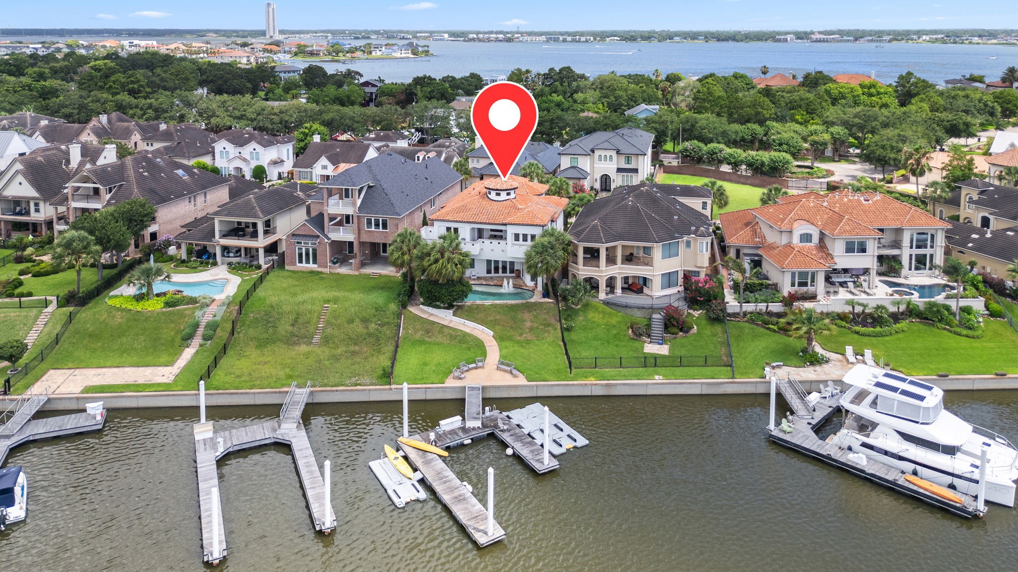 A spacious double dock complete with jet ski ramps awaits its next vessel, perfectly designed for an active waterfront lifestyle.
