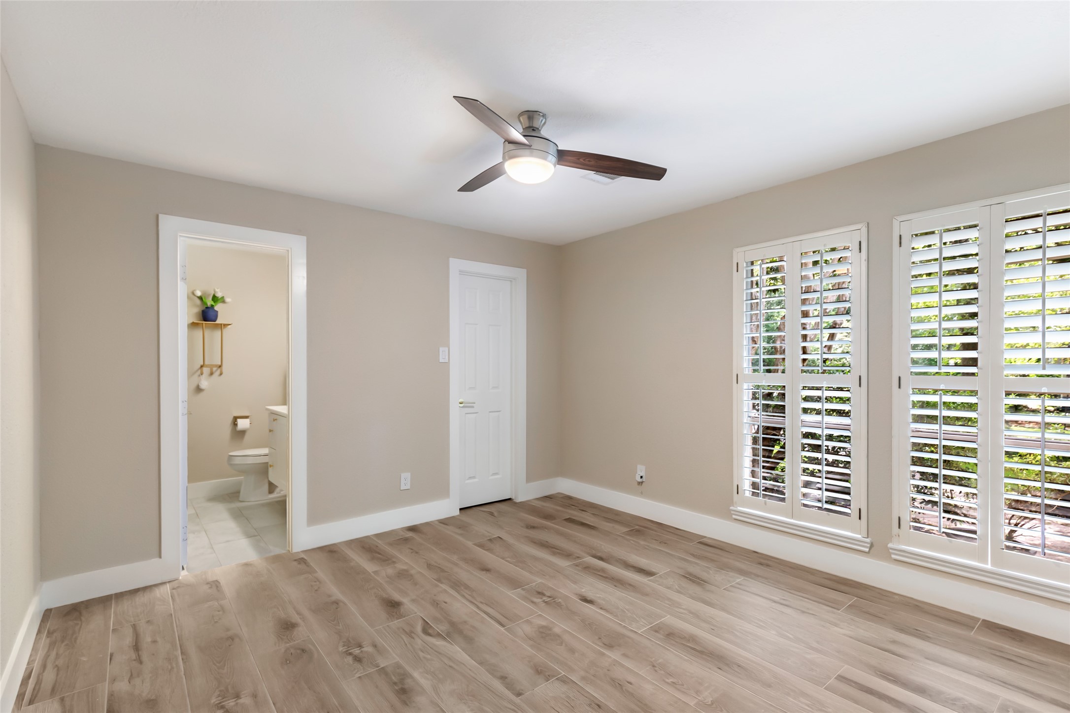 This secondary bedroom has an ensuite full bathroom and roomy closet!