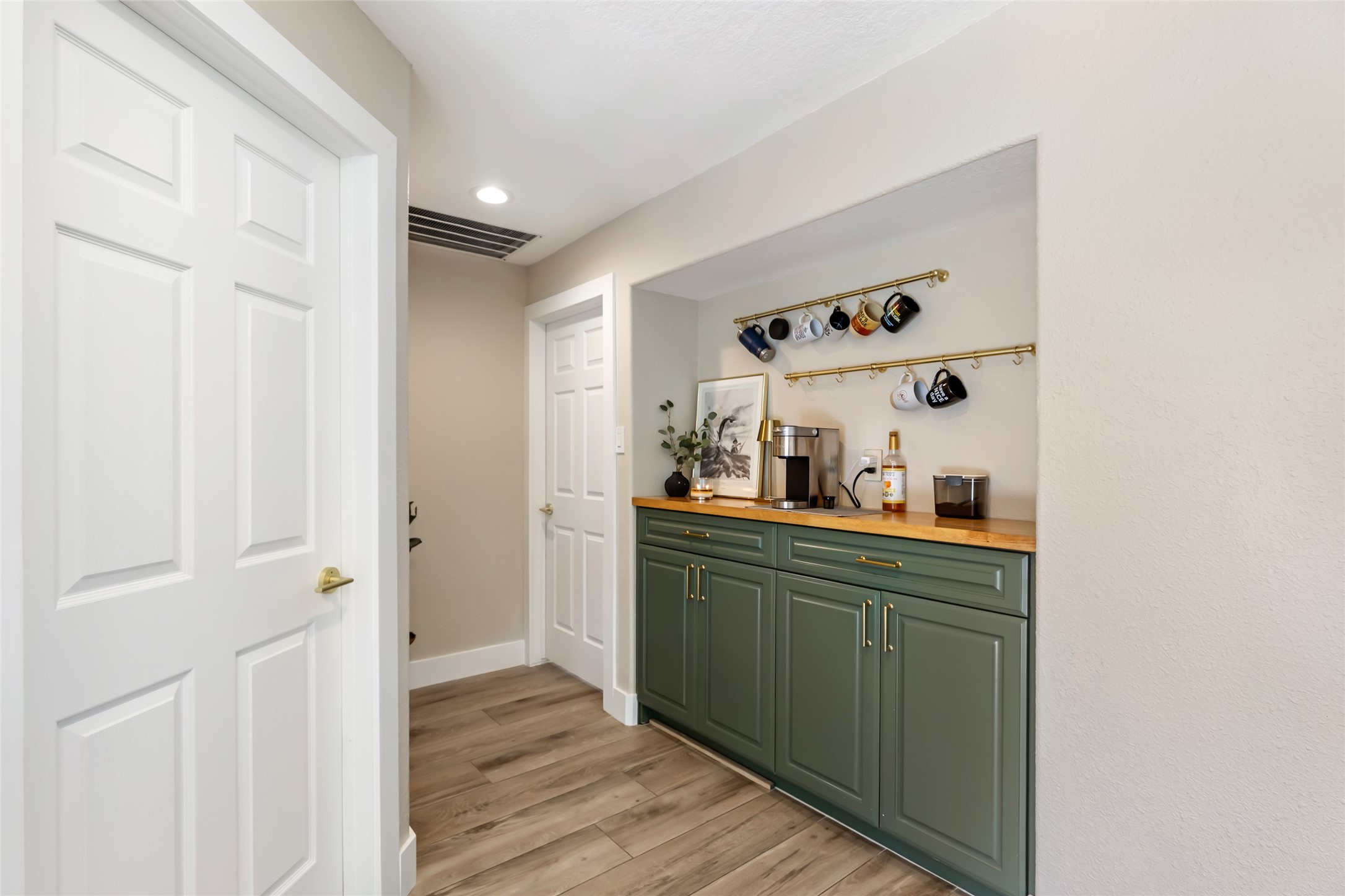 Charming hallway with custom coffee nook.