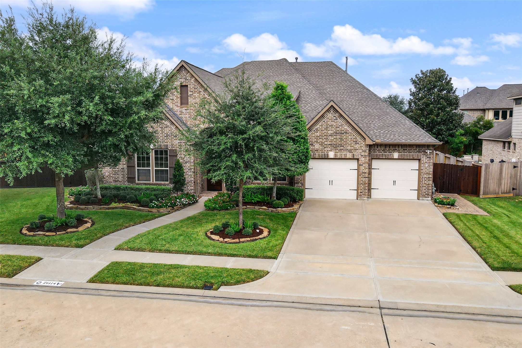 Another view of the front of the home.  Both of the garage doors have exterior keypads for a quick open when needed.