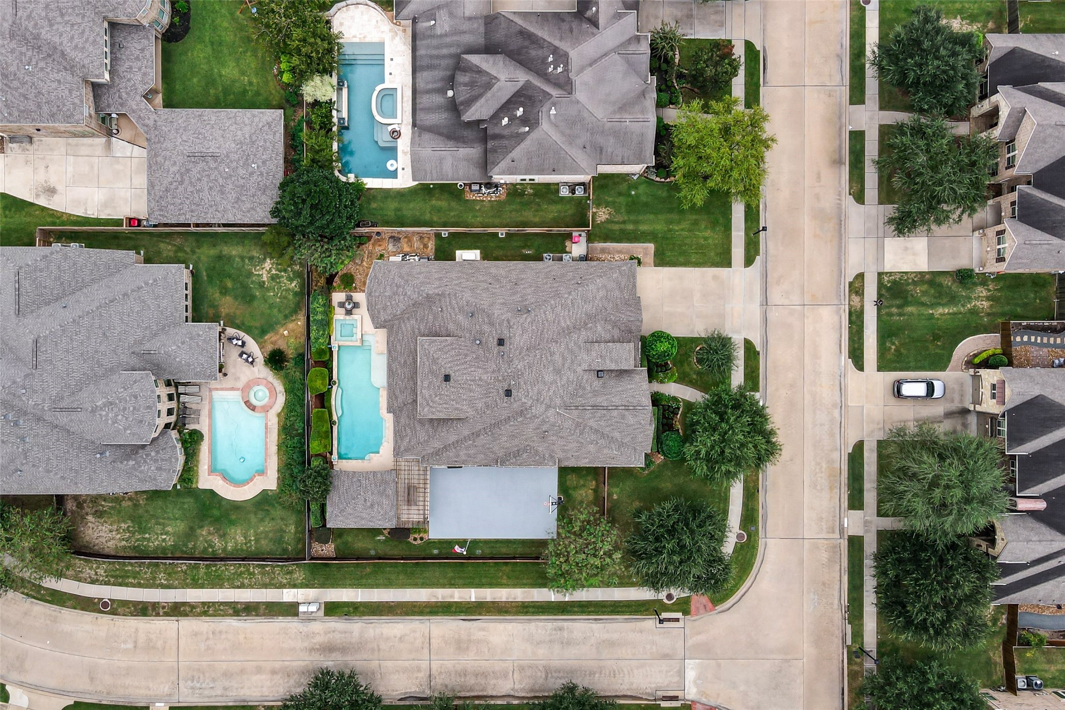 Another aerial shot looking down over the top of the property.  Great shot of the new roof with a lifetime (limited) warranty installed 7/2026 with transferrable warranty.