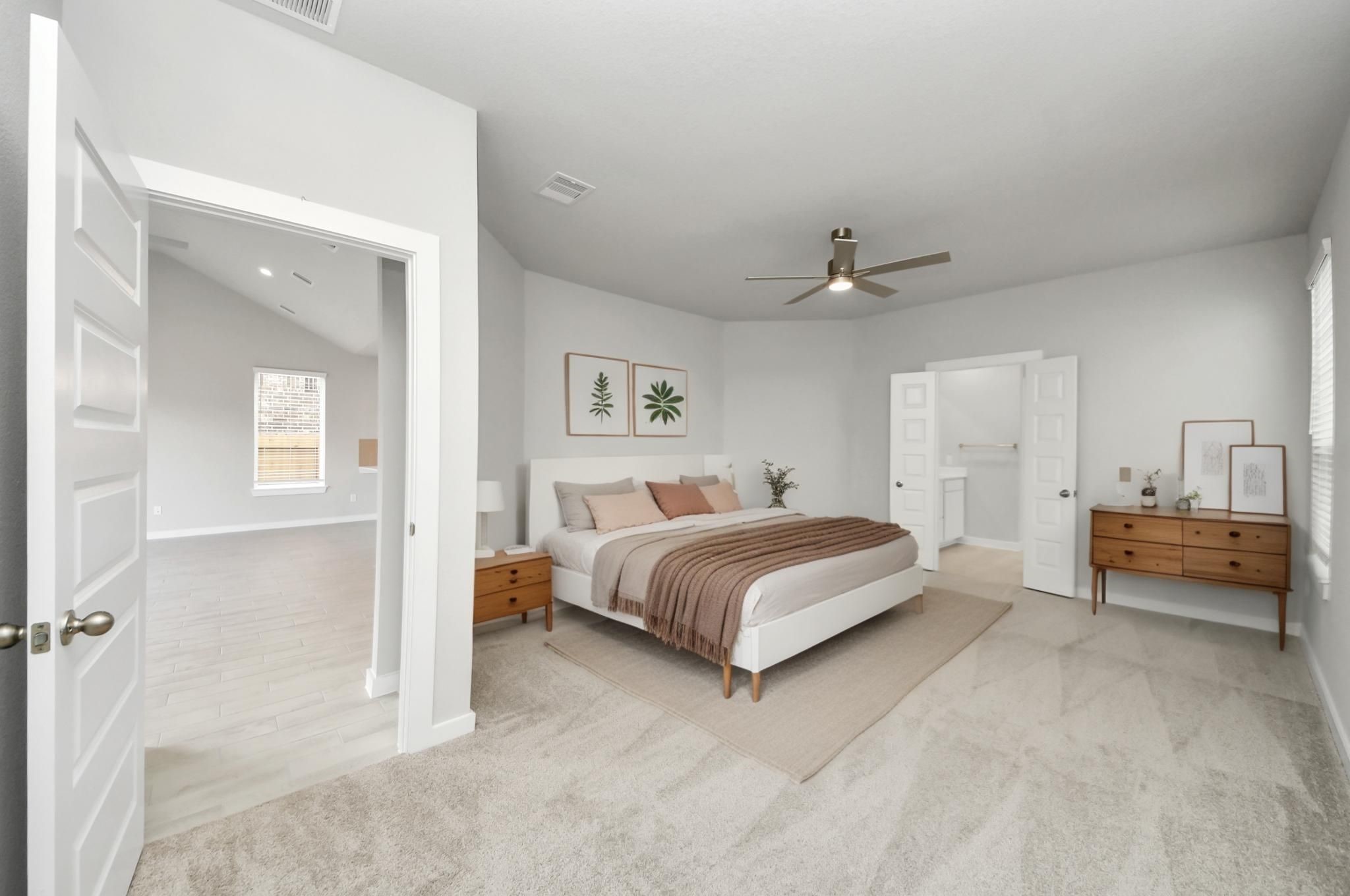 Virtually Staged - Primary Bedroom. Sample photo of completed home with similar floor plan. Actual colors and selections may vary.