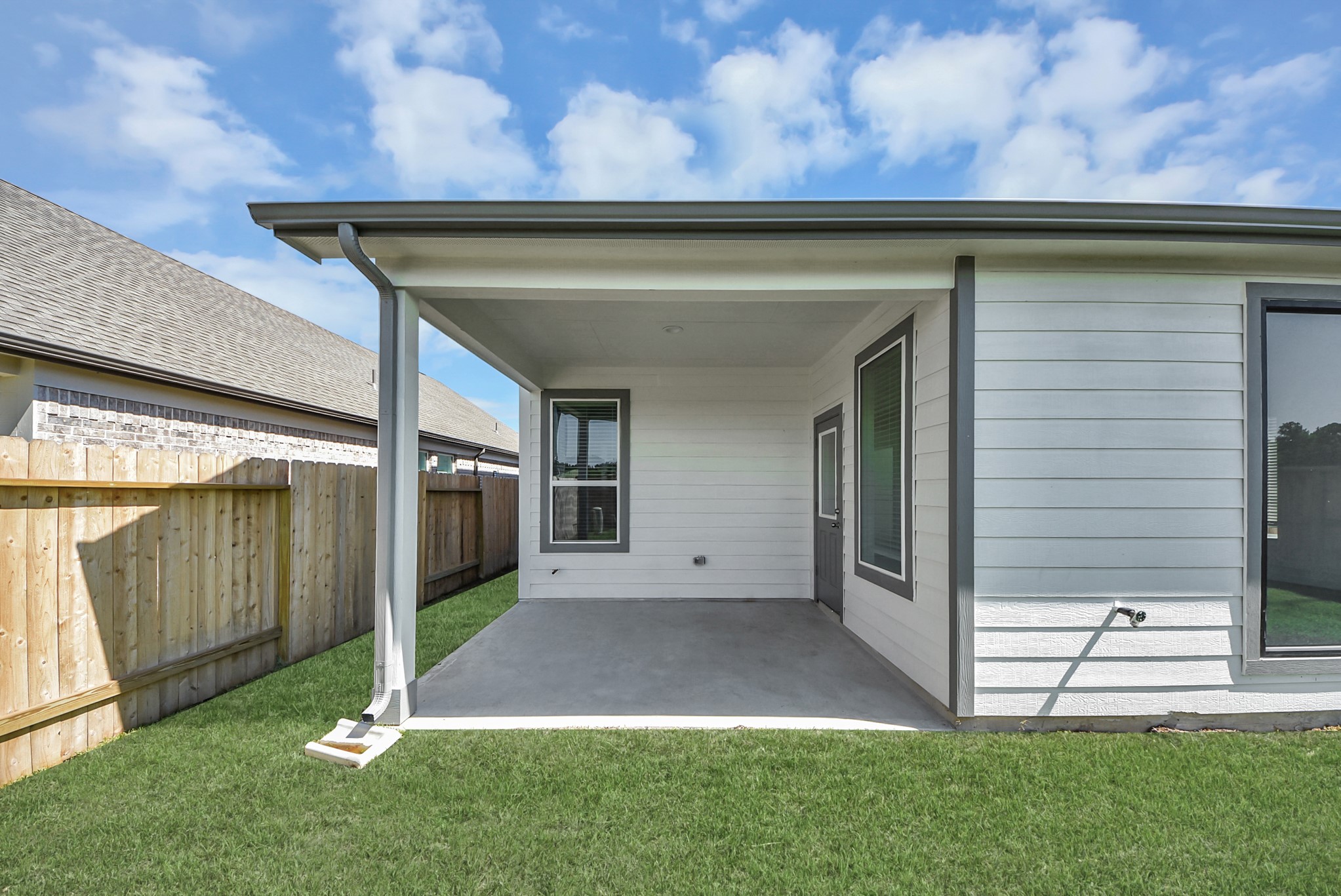 Explore the expansive backyard with its inviting covered patioa perfect blend of space for the kids to play and adults to unwind. Ideal for creating your outdoor oasis, this backyard accommodates patio furniture, a BBQ pit, and endless possibilities for leisure and entertainment.