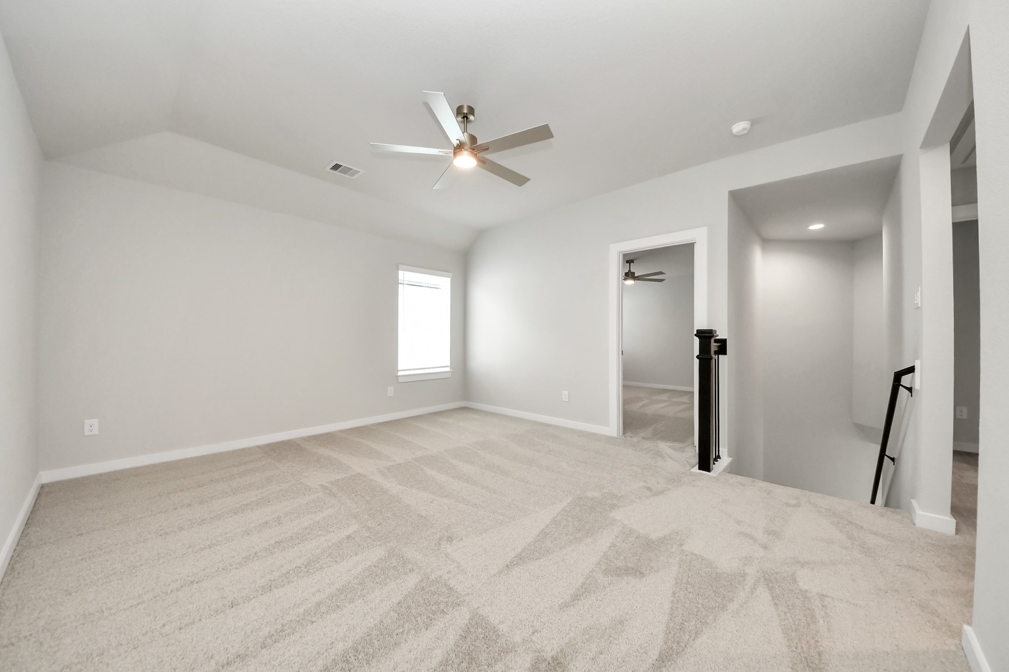 Come upstairs and enjoy a day of leisure in this fabulous game room! This is the perfect hangout spot or adult game room! Features plush carpet, high ceilings, custom paint and windows for plenty of natural light Sample photo of completed home with similar floor plan. Actual colors and selections may vary.
.
