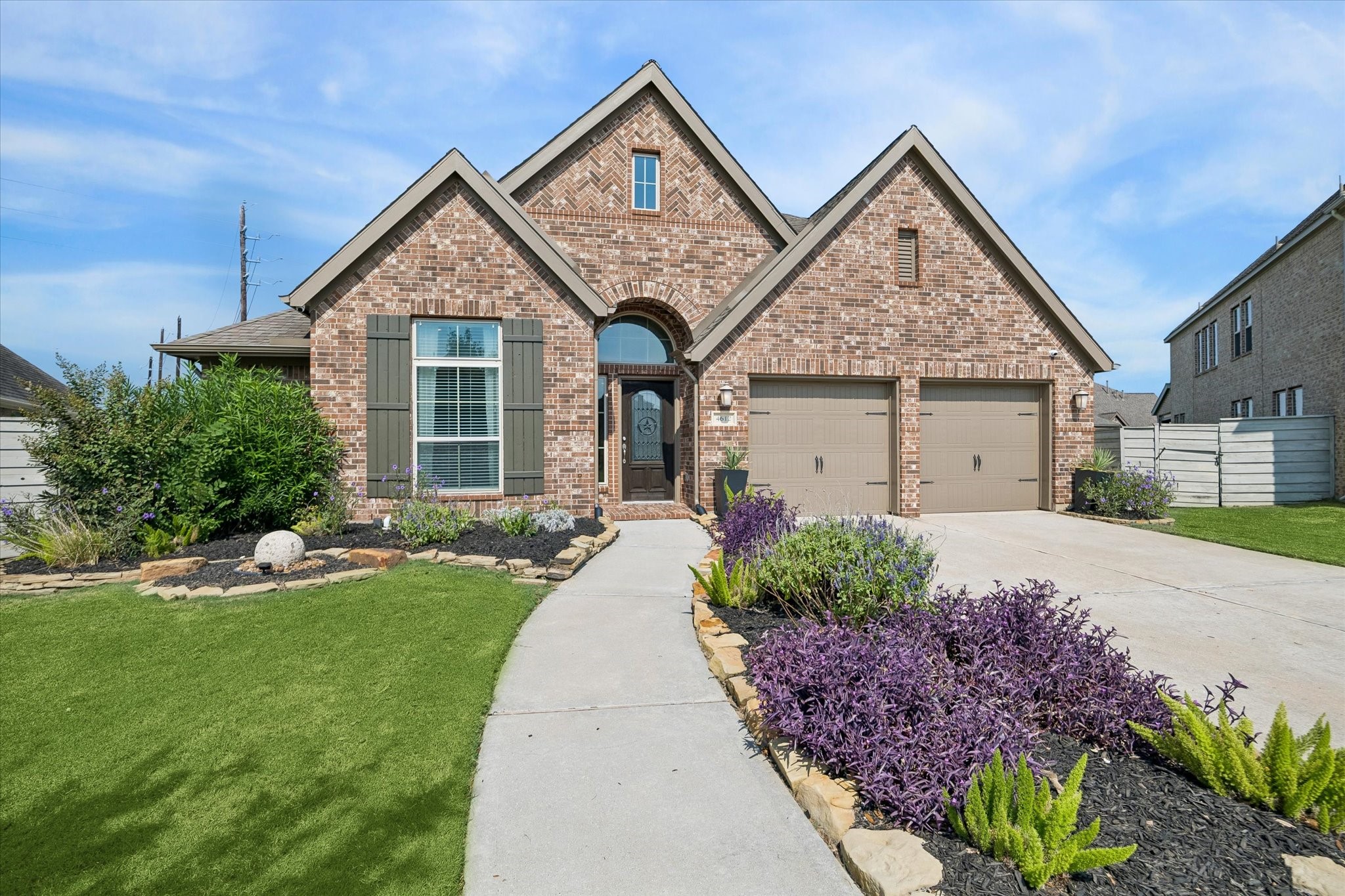 While the backyard is a showstopper, the curb appeal is also beautiful at 4612 Mesquite Terrace. Absolutely gorgeous curb appeal with well manicured flowerbeds. While the backyard is a showstopper, the curb appeal is also beautiful at 4612 Mesquite Terrace. Absolutely gorgeous curb appeal with well manicured flowerbeds.