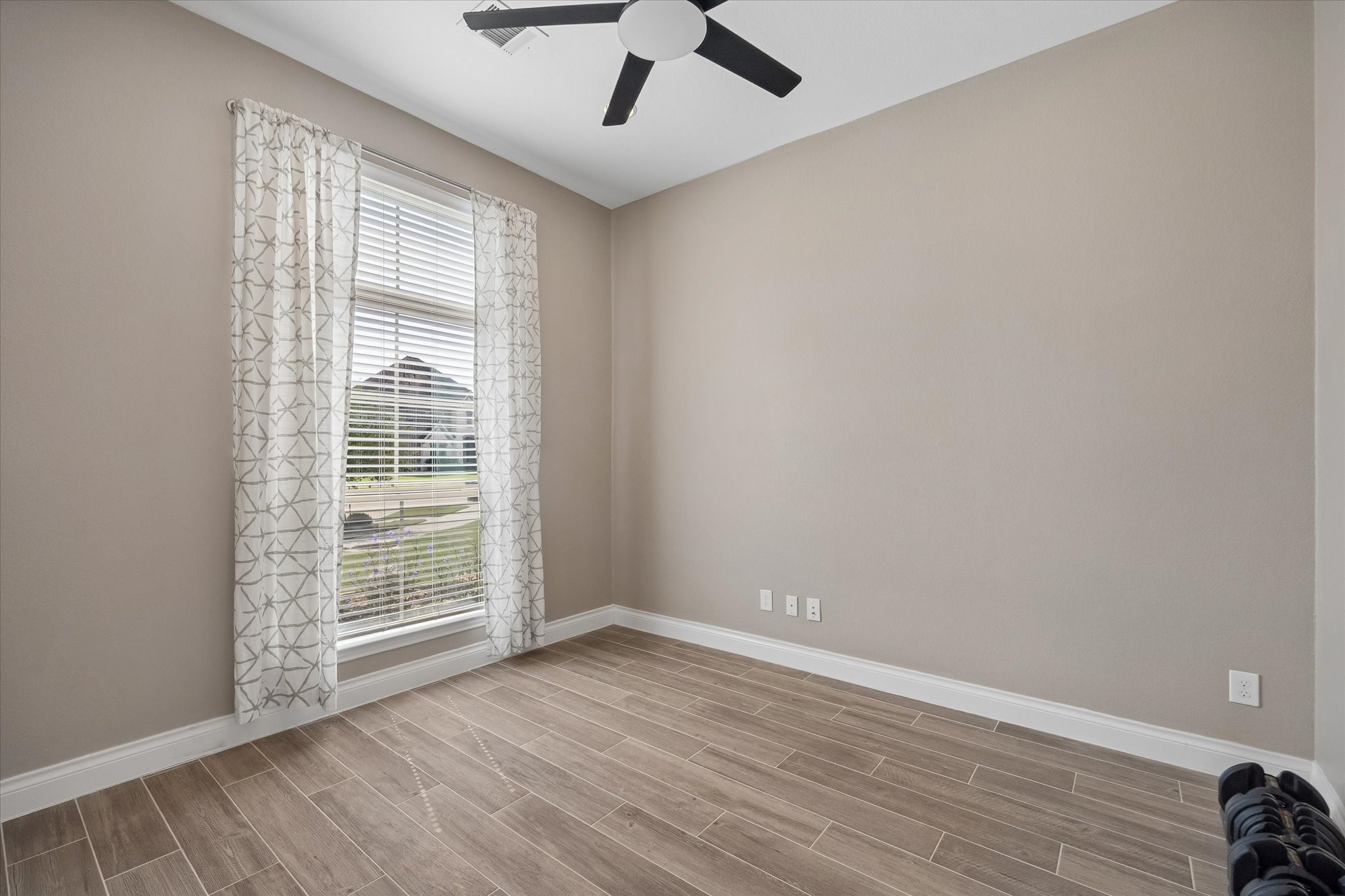 The office space offers a large window looking out the front of the home. The office is private with the double French doors. The office space offers a large window looking out the front of the home. The office is private with the double French doors.