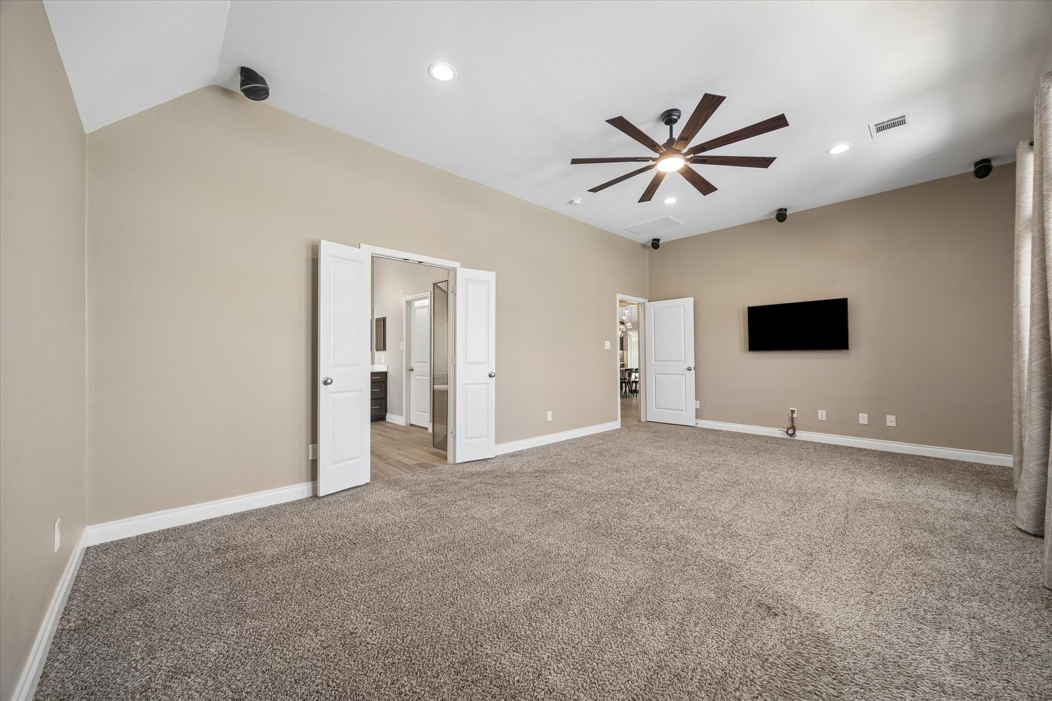 Another view of the oversized primary bedroom