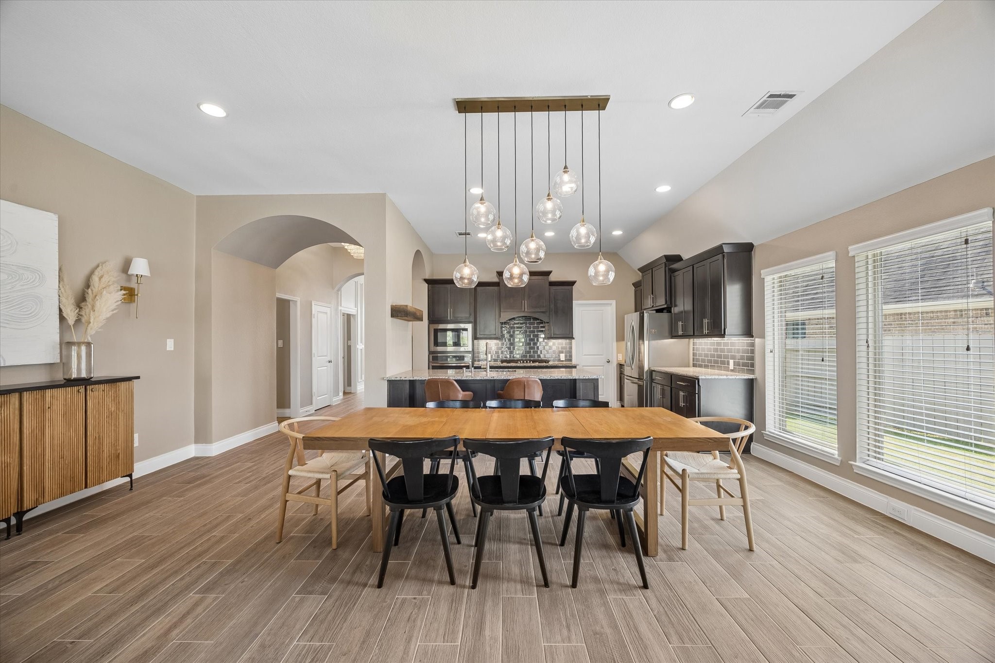 The dining area is spacious and part of the natural flow of the home. The dining area is spacious and part of the natural flow of the home.