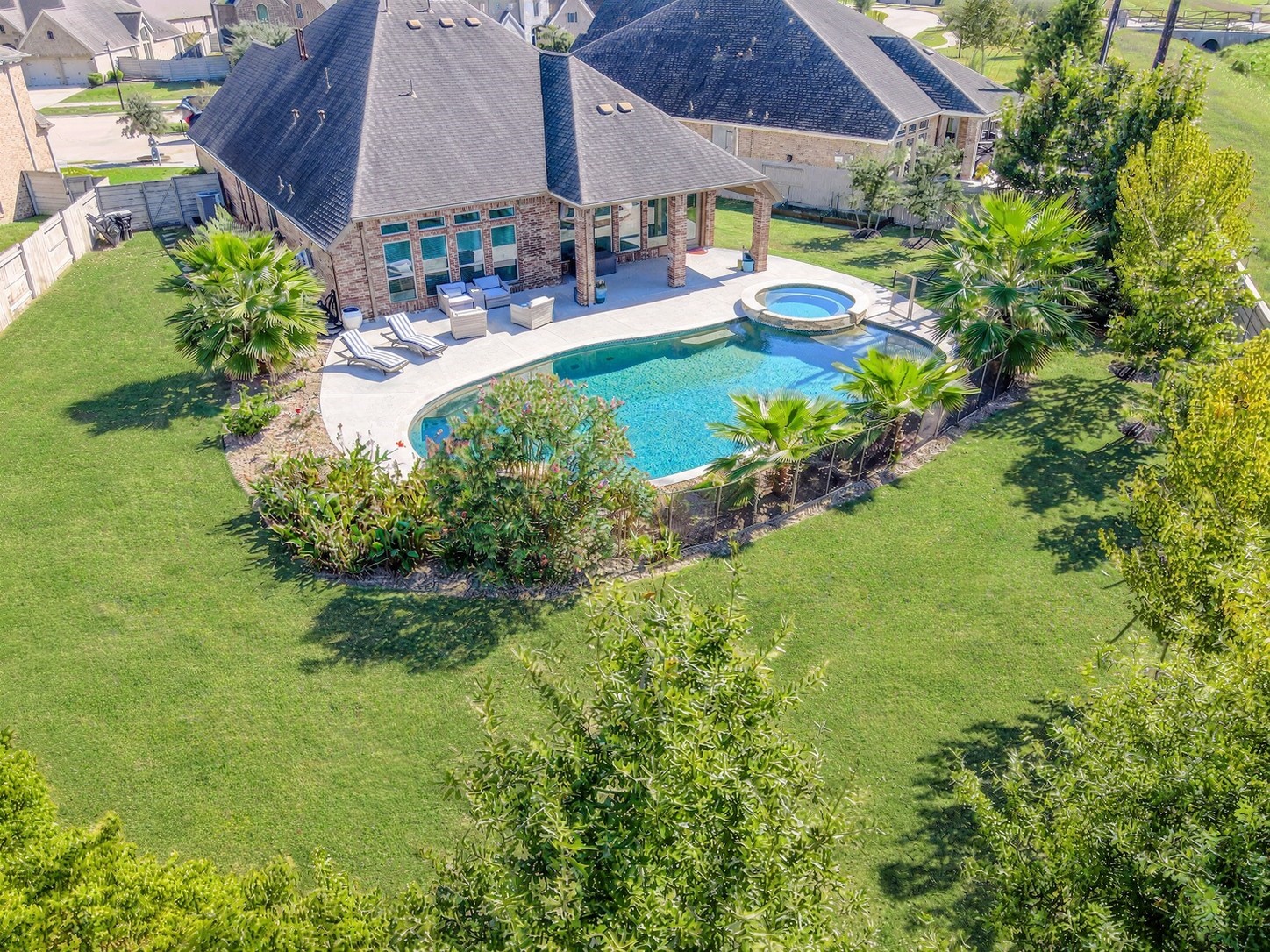 Welcome to your backyard oasis: a Texas-sized pool in a large lot with no back neighbors. If privacy and vacation vibes are what you're looking for, look no further. This custom backyard offers so many thoughtful updates, including the covered patio, cool deck, landscaping for ultimate privacy and so much more! Welcome to your backyard oasis: a Texas-sized pool in a large lot with no back neighbors. If privacy and vacation vibes are what you're looking for, look no further. This custom backyard offers so many thoughtful updates, including the covered patio, cool deck, landscaping for ultimate privacy and so much more!