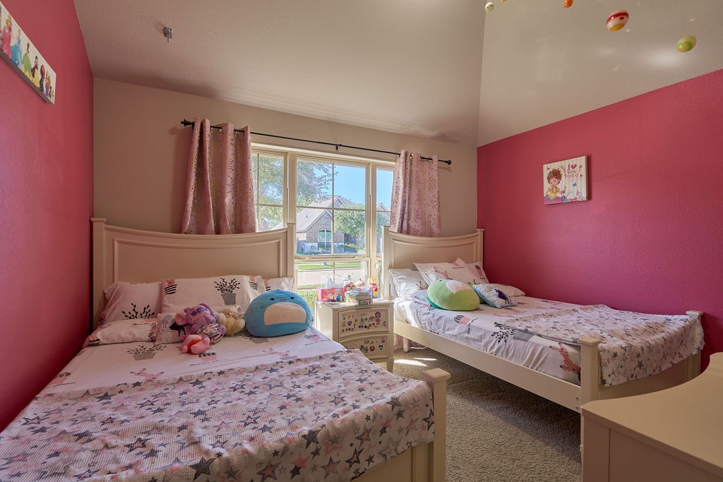 Generously Sized Bedroom with Vibrant Personality!