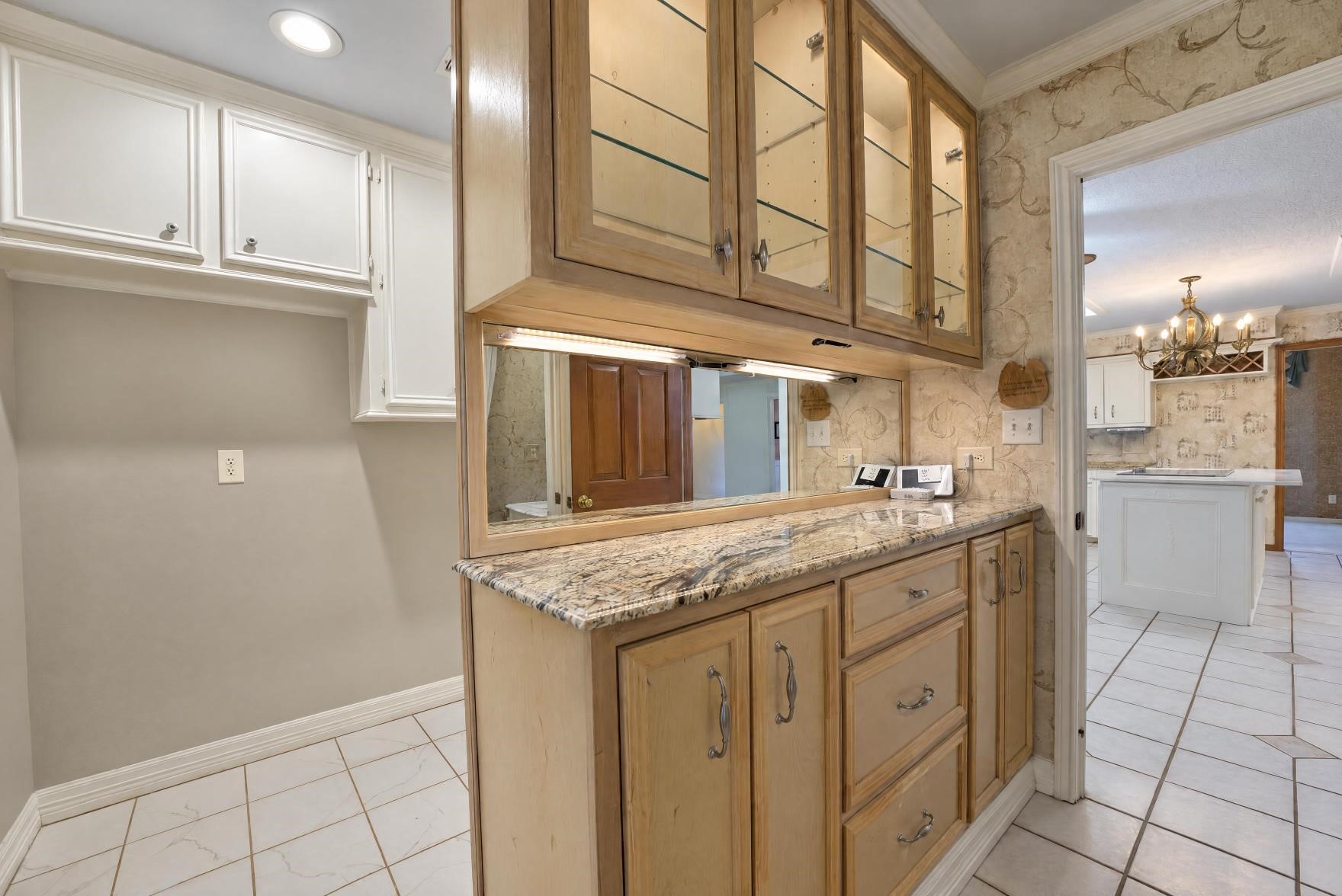 Built-ins in the hallway leading to the utility room