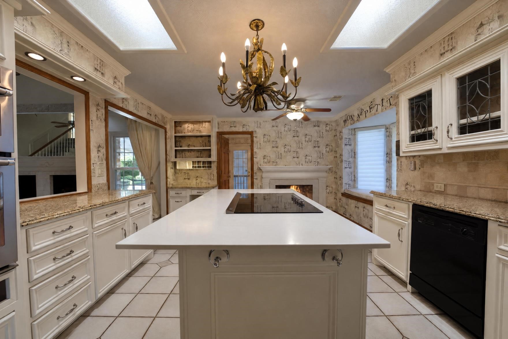Large quartz island with cooktop