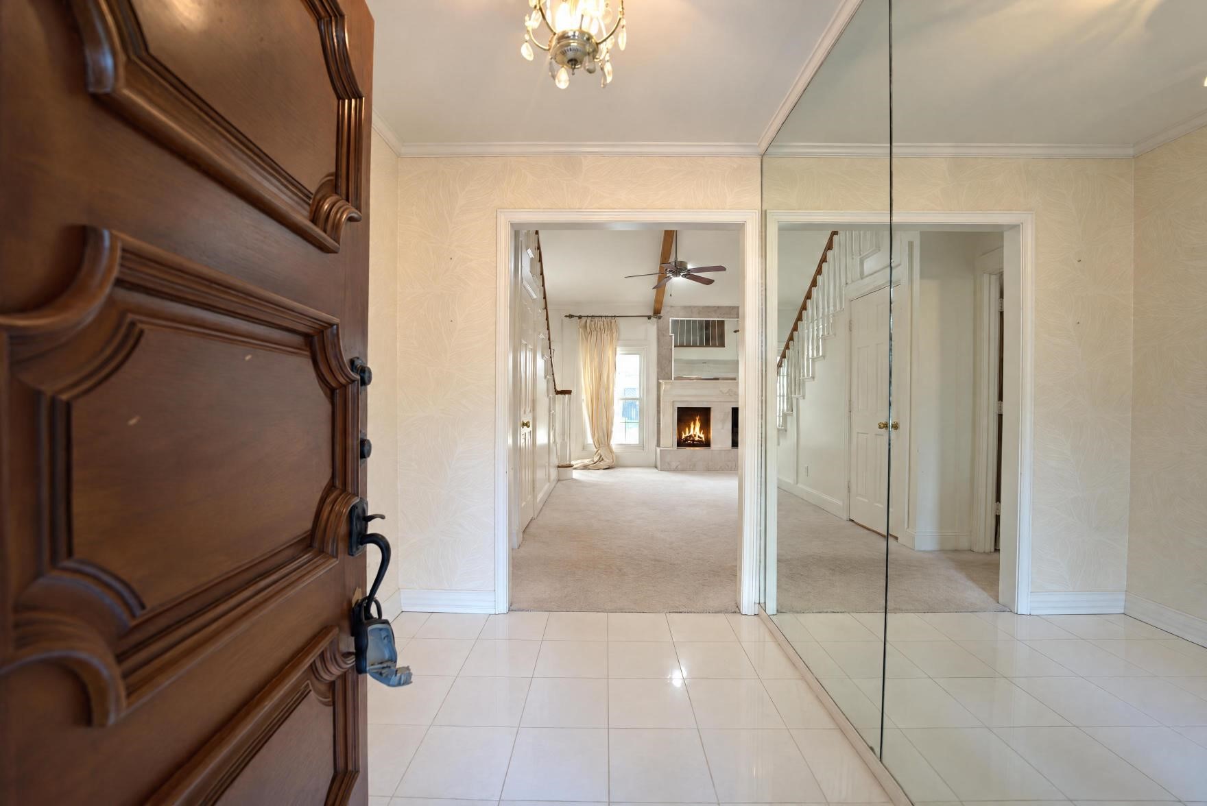 Entering the foyer through the front ndoor