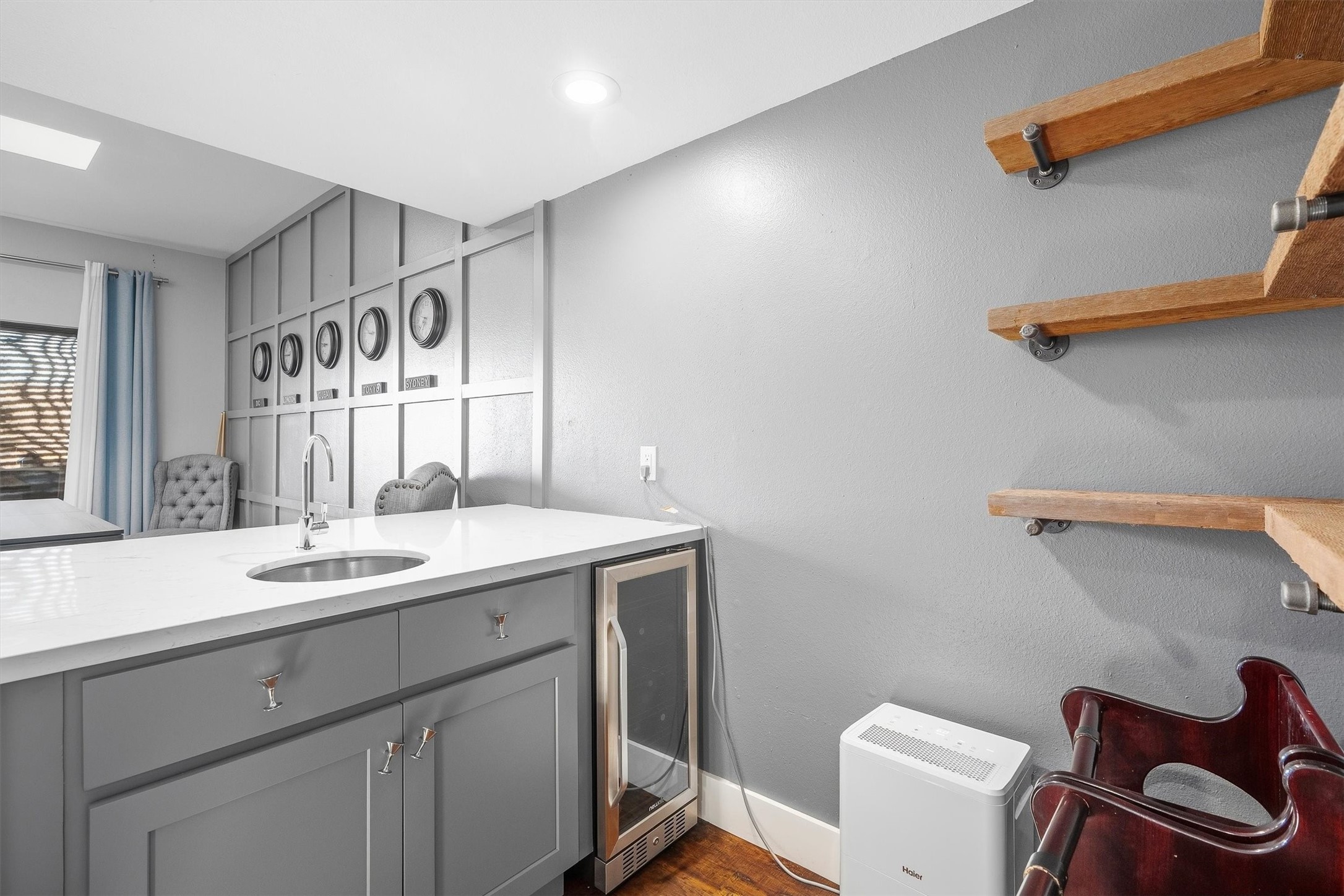 Designer wet bar perfectly situated for entertaining guests.