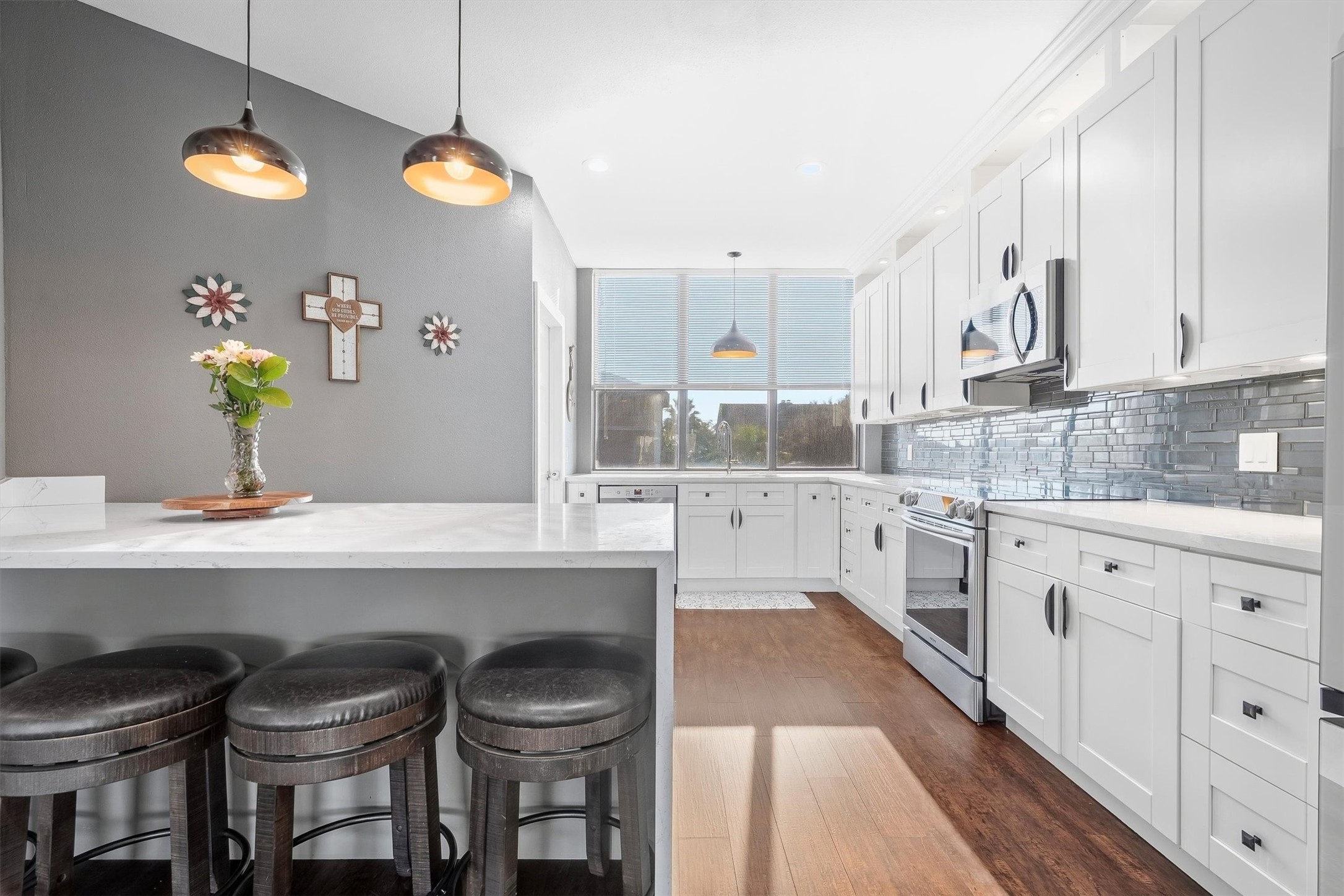 Premium stainless steel appliances integrated throughout.