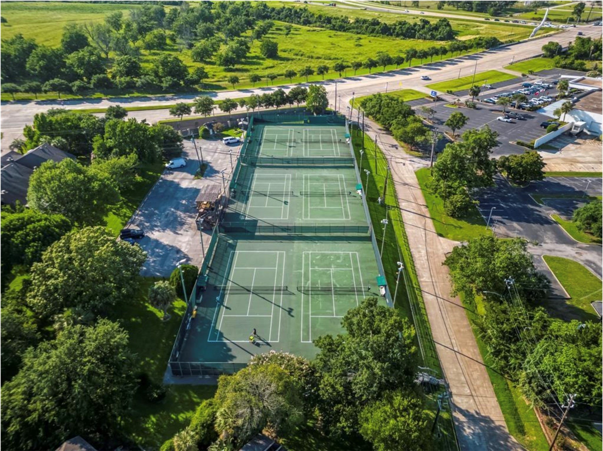 Enjoy a quick game with your friends at the community tennis court!