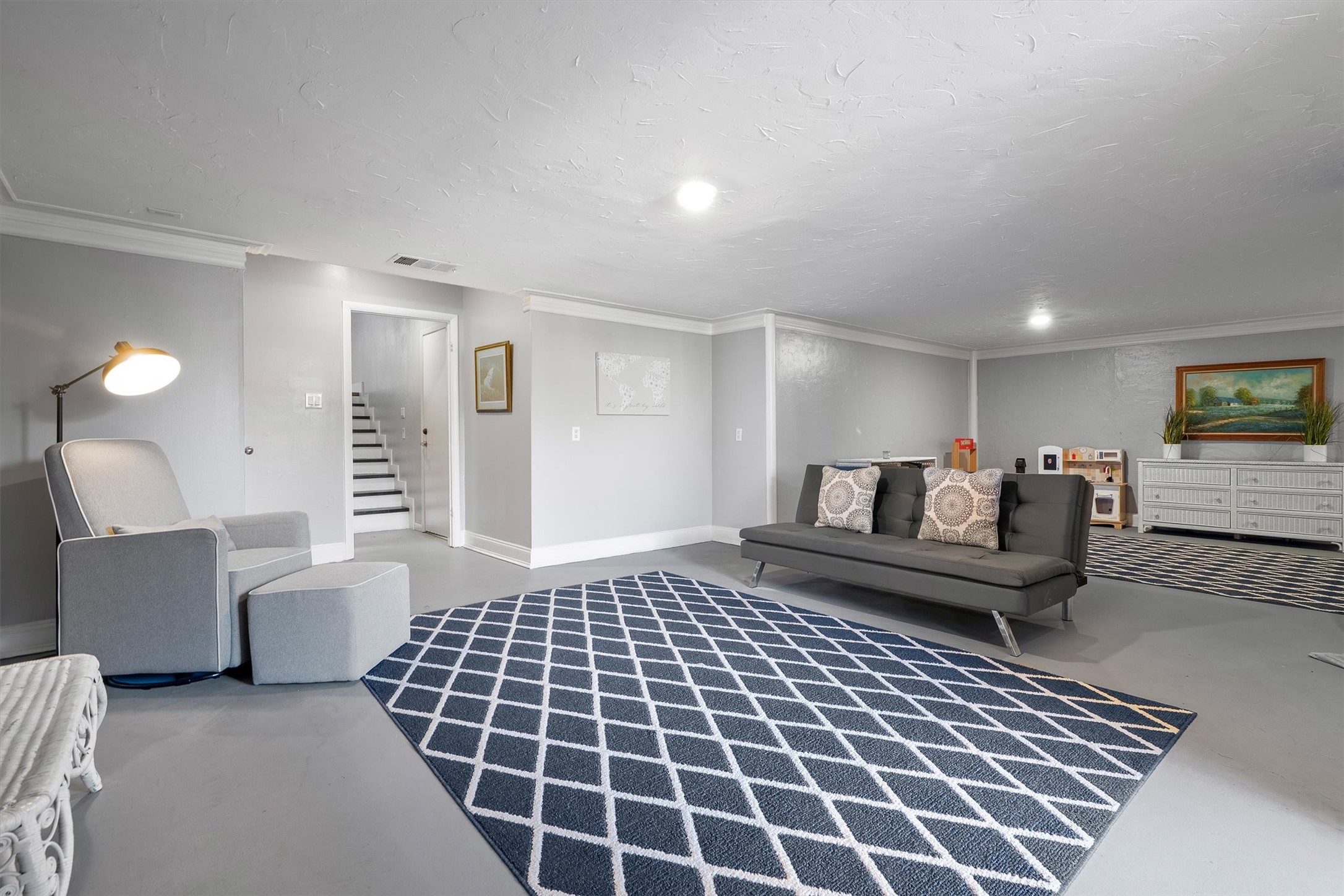 Fully completed lower level offering flexible living options.