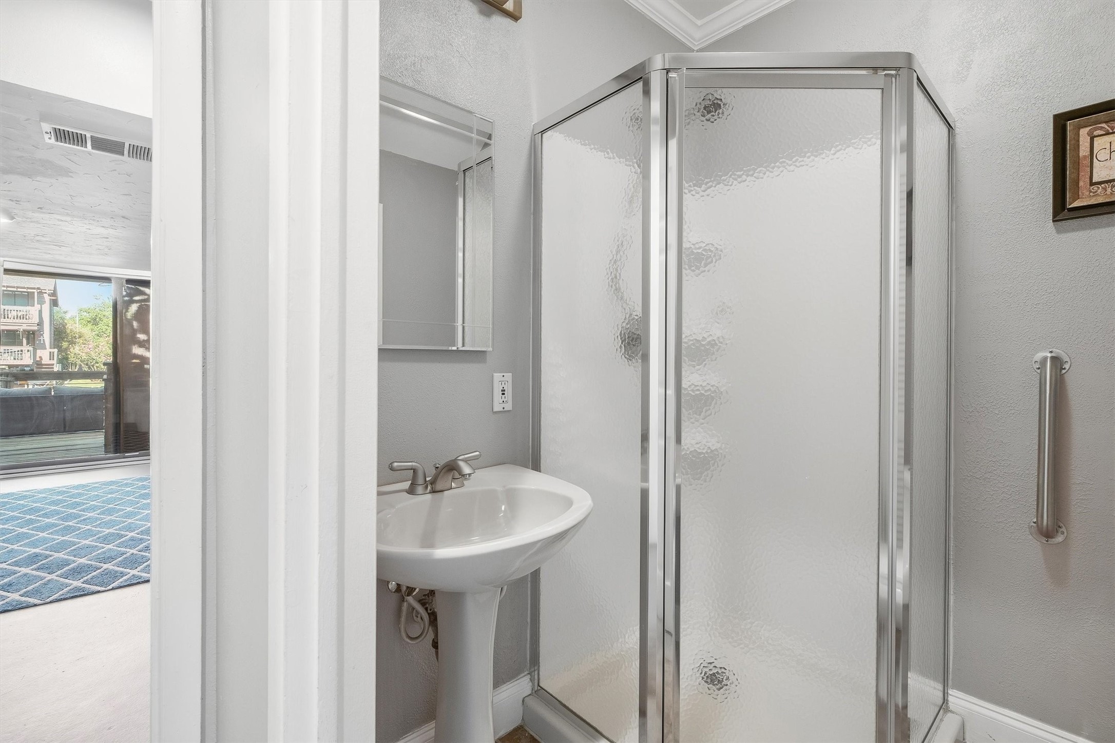 Downstairs full bath with walk-in shower.