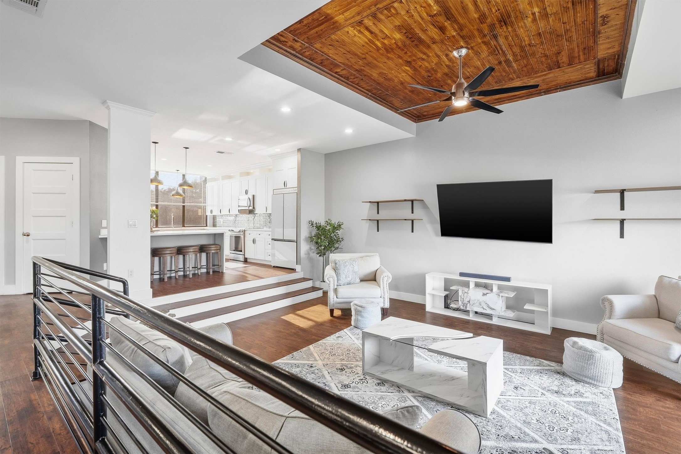 Sunken living room with stunning ceiling detail. Sunken living room with stunning ceiling detail.
