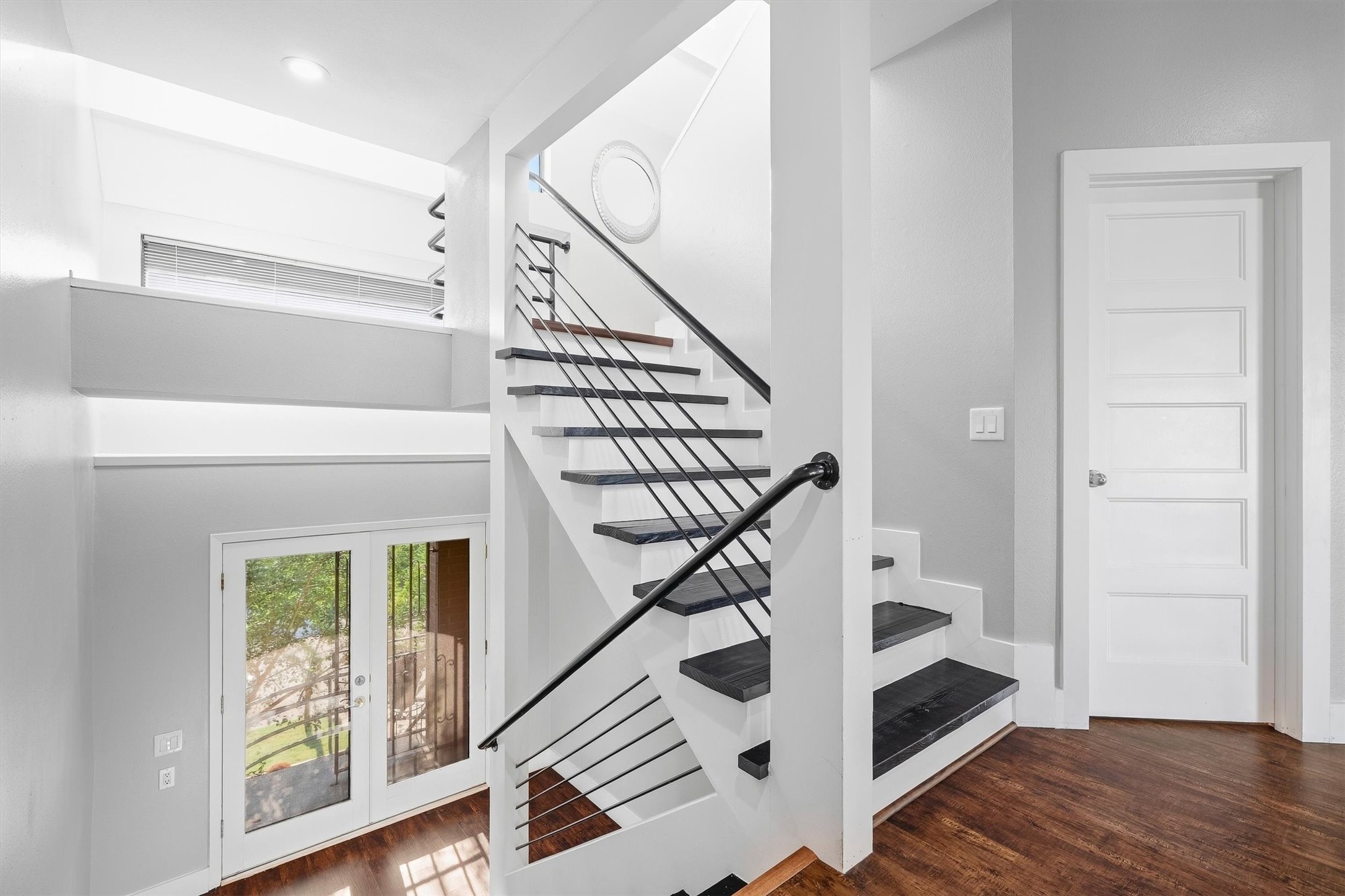 High ceilings and sleek flooring complement the open space. High ceilings and sleek flooring complement the open space.