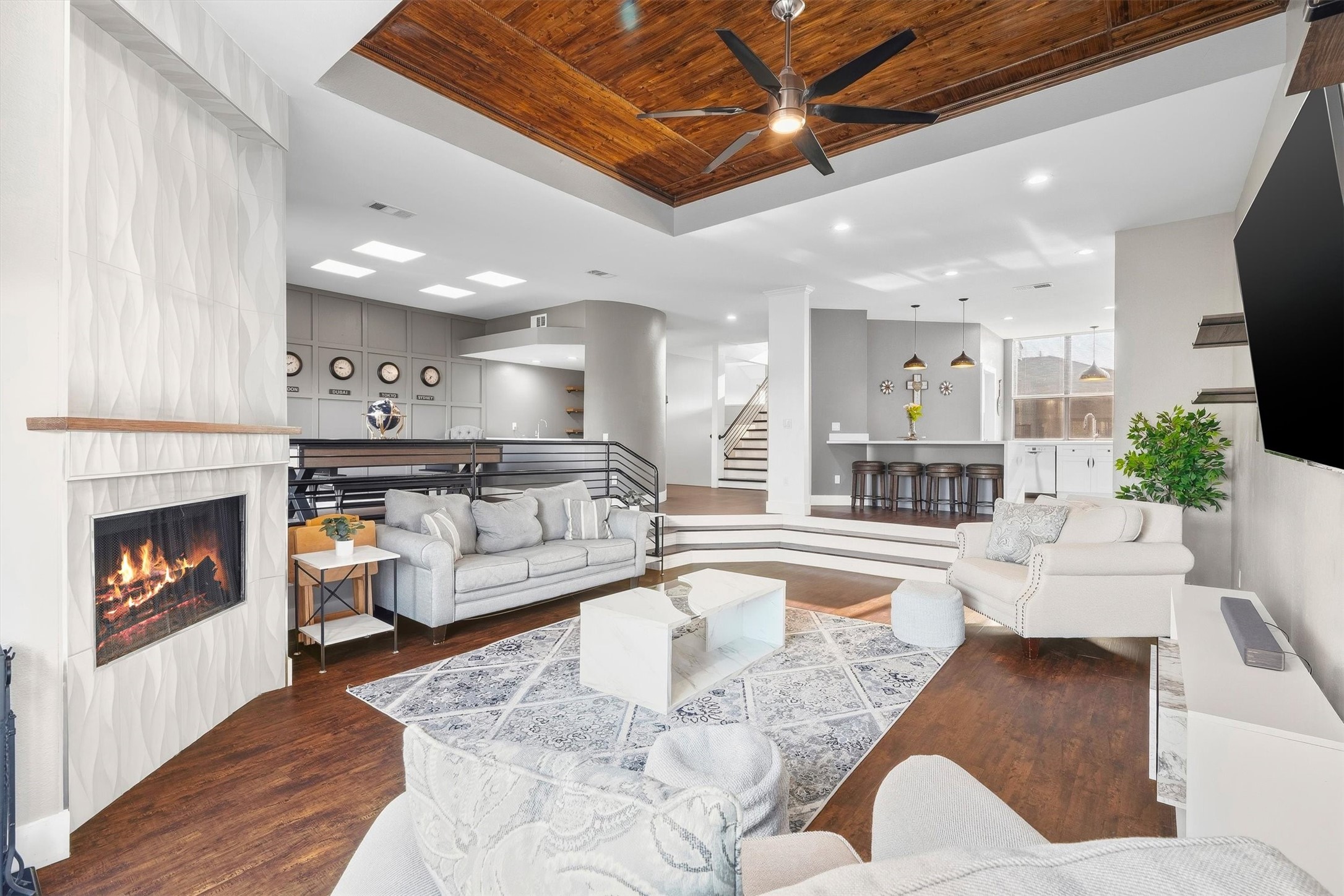 Seamless layout connecting kitchen, dining, and living areas.
