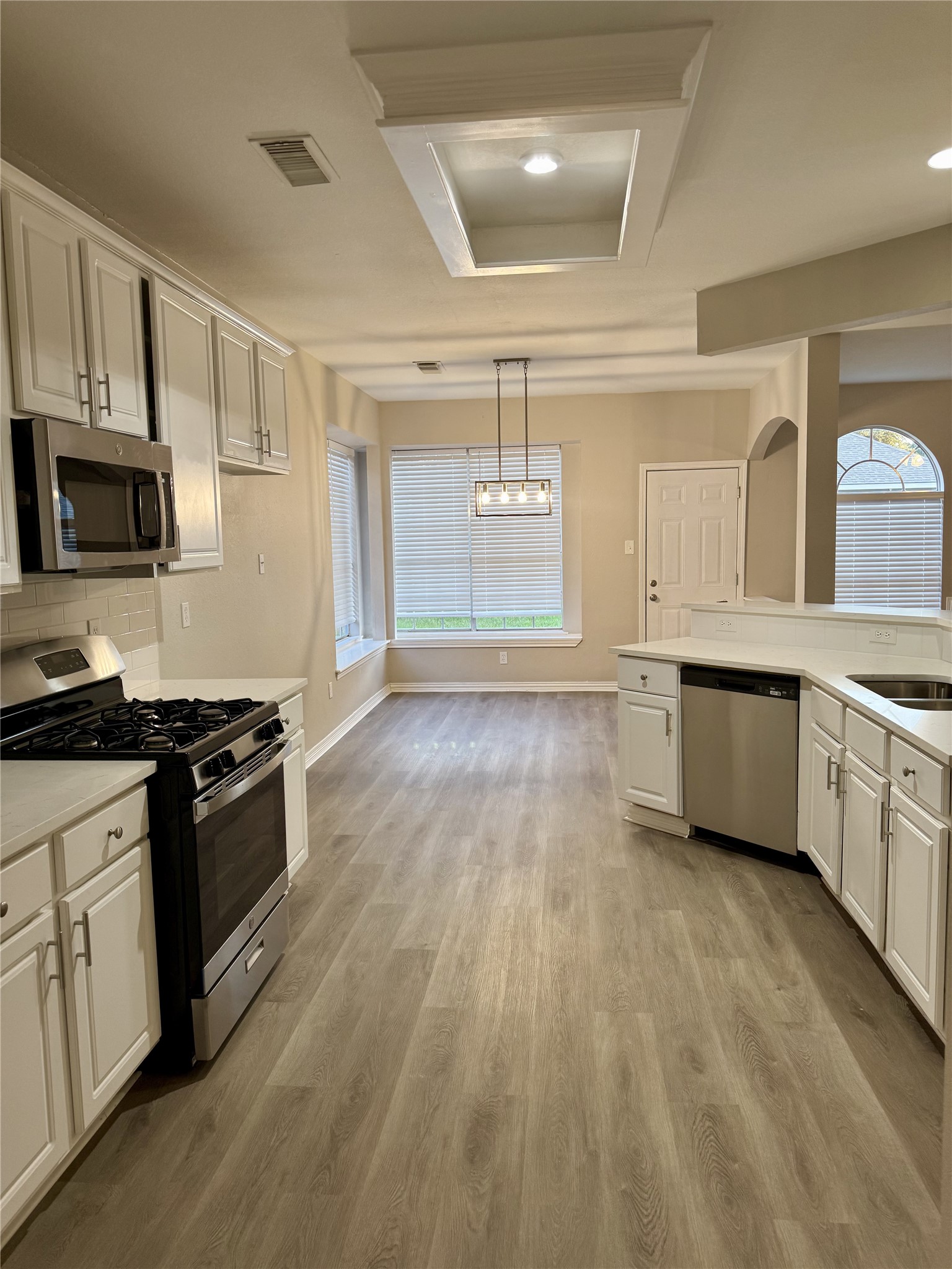 Kitchen looking into Breakfast Nook