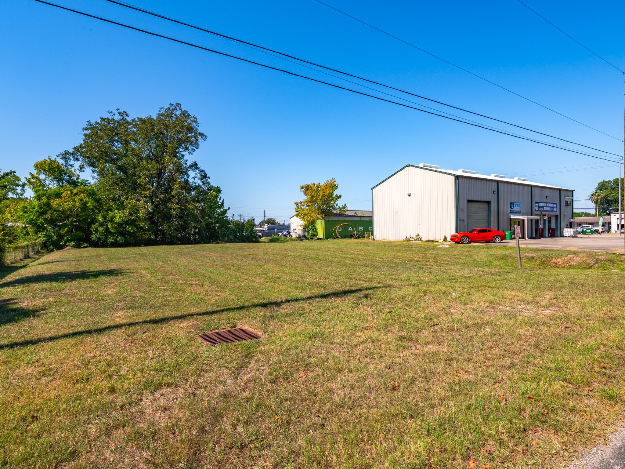 Additional ground-level perspective showing the open lot and street frontage. Additional ground-level perspective showing the open lot and street frontage.