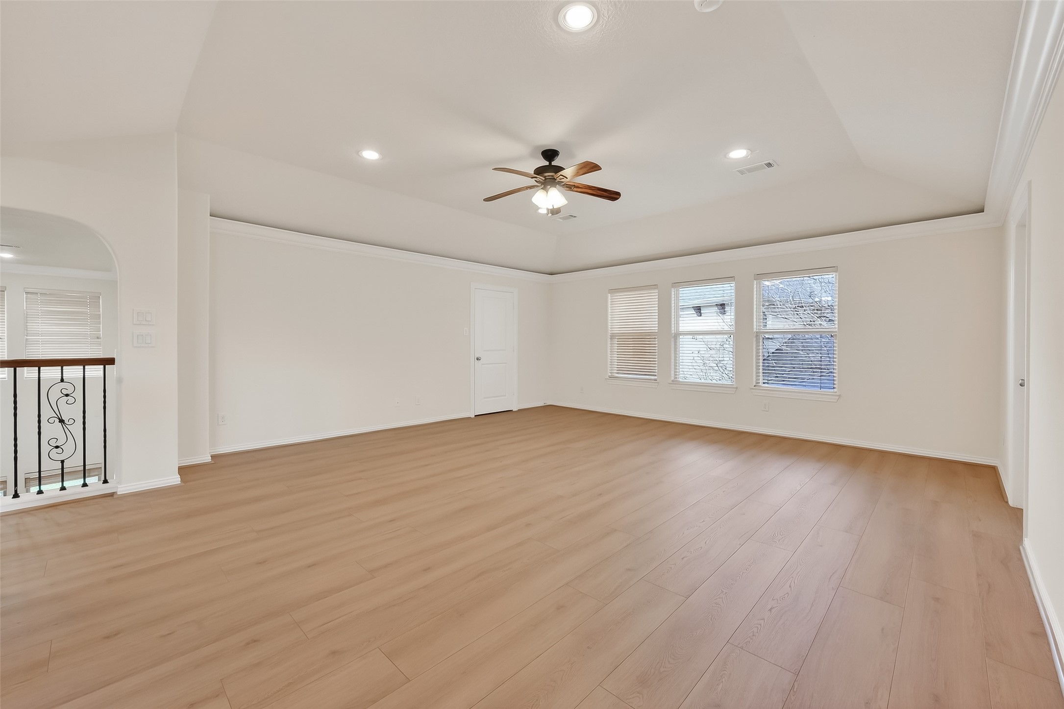 Expansive Game Room offers, coffered ceilings, recessed lights and access to a great storage area that can be used as a flex room too.