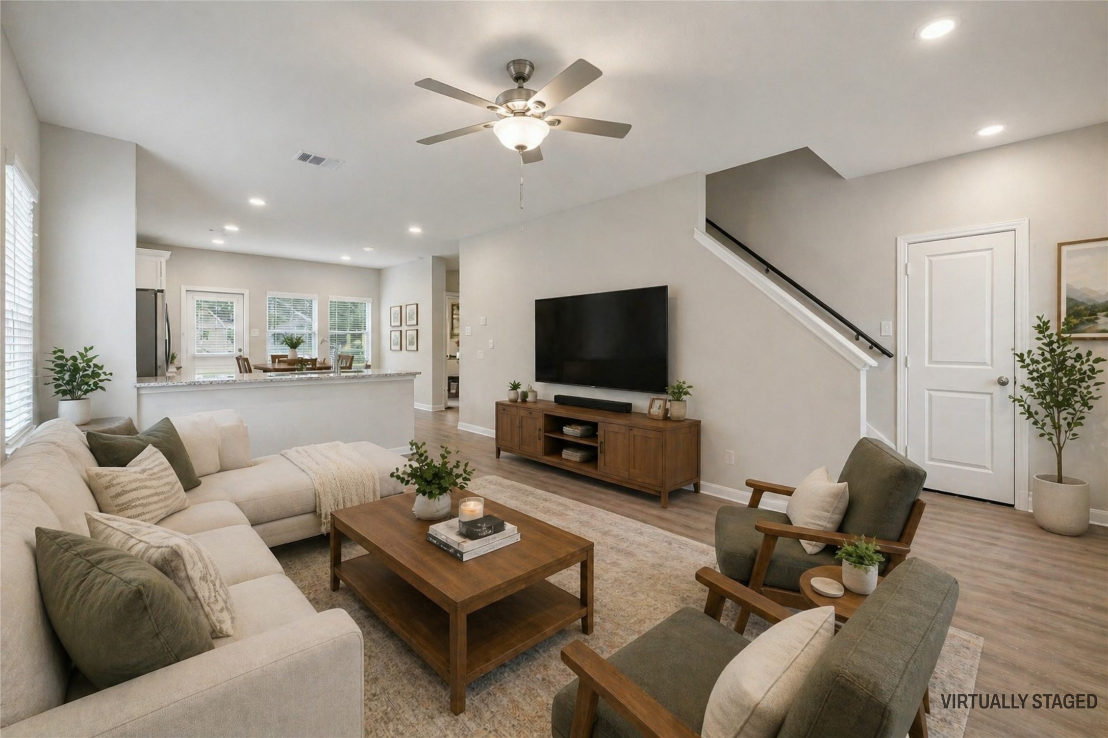 Virtually staged photo of living room.