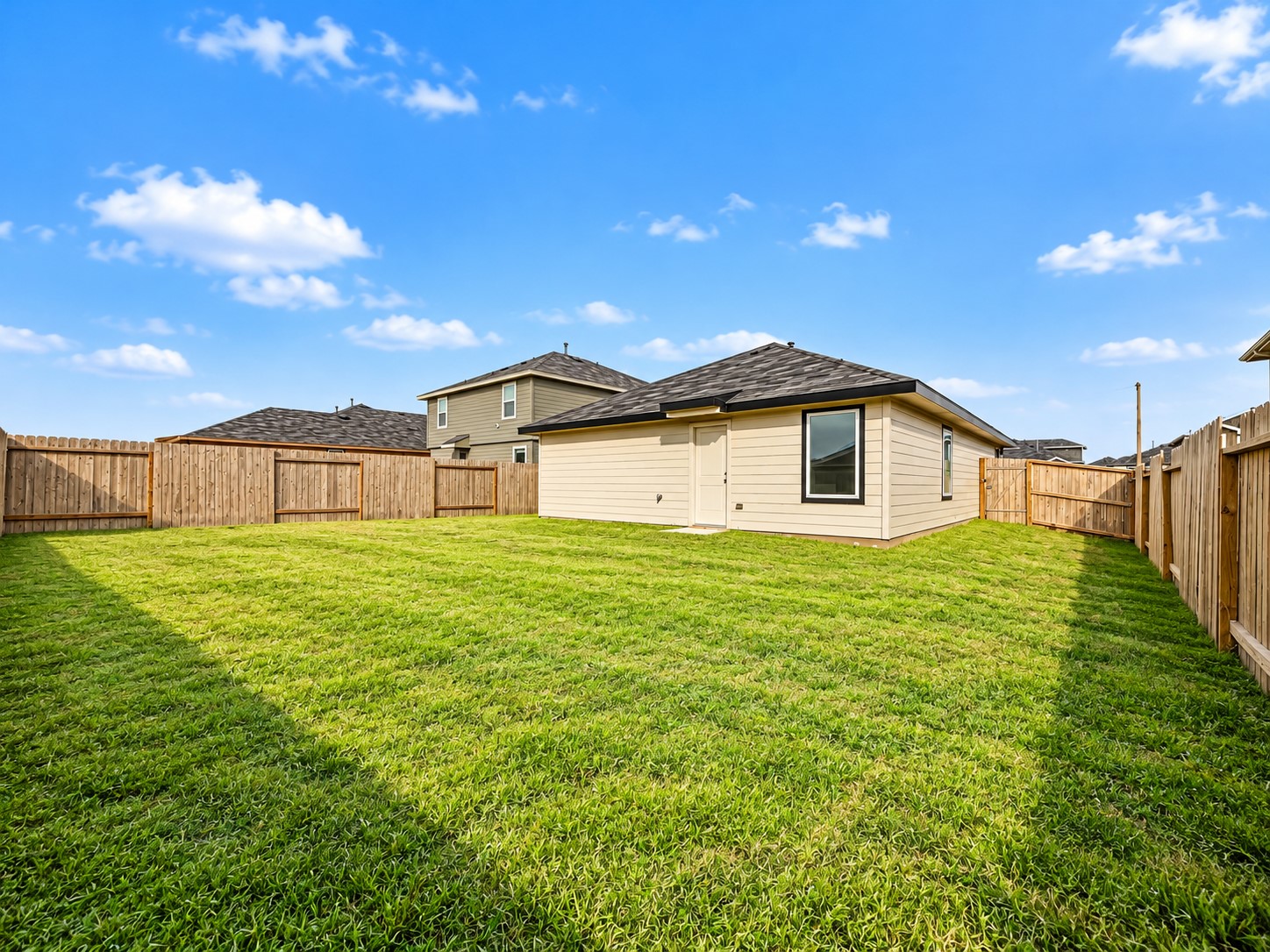 The large backyard offers plenty of
space for entertaining or your kids
or pets to run around and play.
