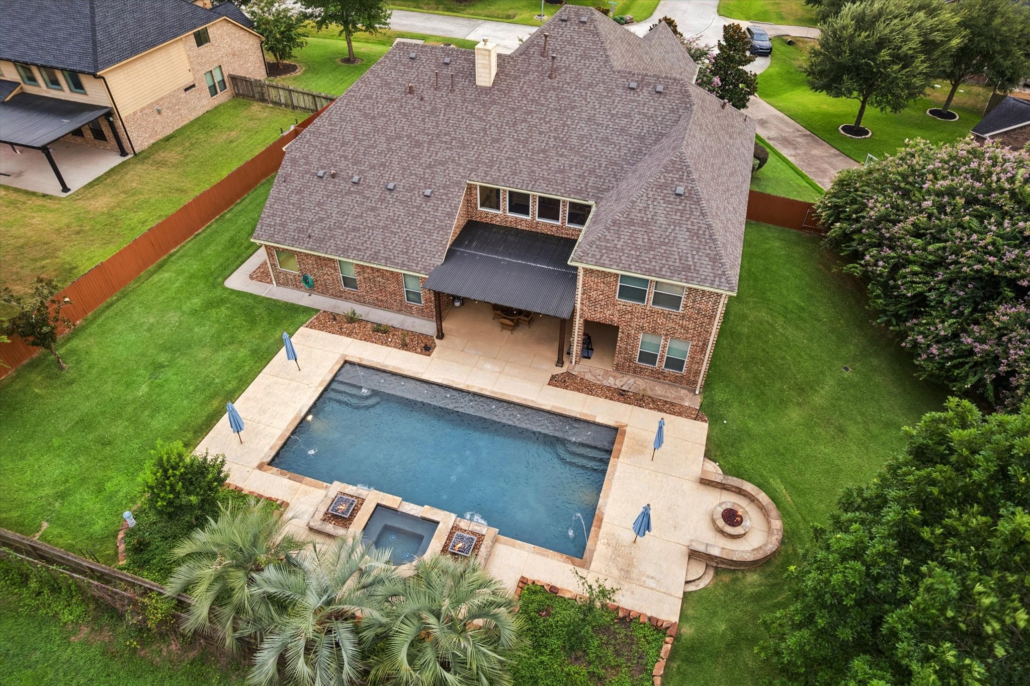 Welcome home to 24935 Waterstone Estates Circle, an exceptional property located in the acclaimed Waterstone Estates community in Tomball. This stunning aerial view showcases the homes expansive backyard, resort-style pool, and inviting outdoor living spaces. Welcome home to 24935 Waterstone Estates Circle, an exceptional property located in the acclaimed Waterstone Estates community in Tomball. This stunning aerial view showcases the homes expansive backyard, resort-style pool, and inviting outdoor living spaces.
